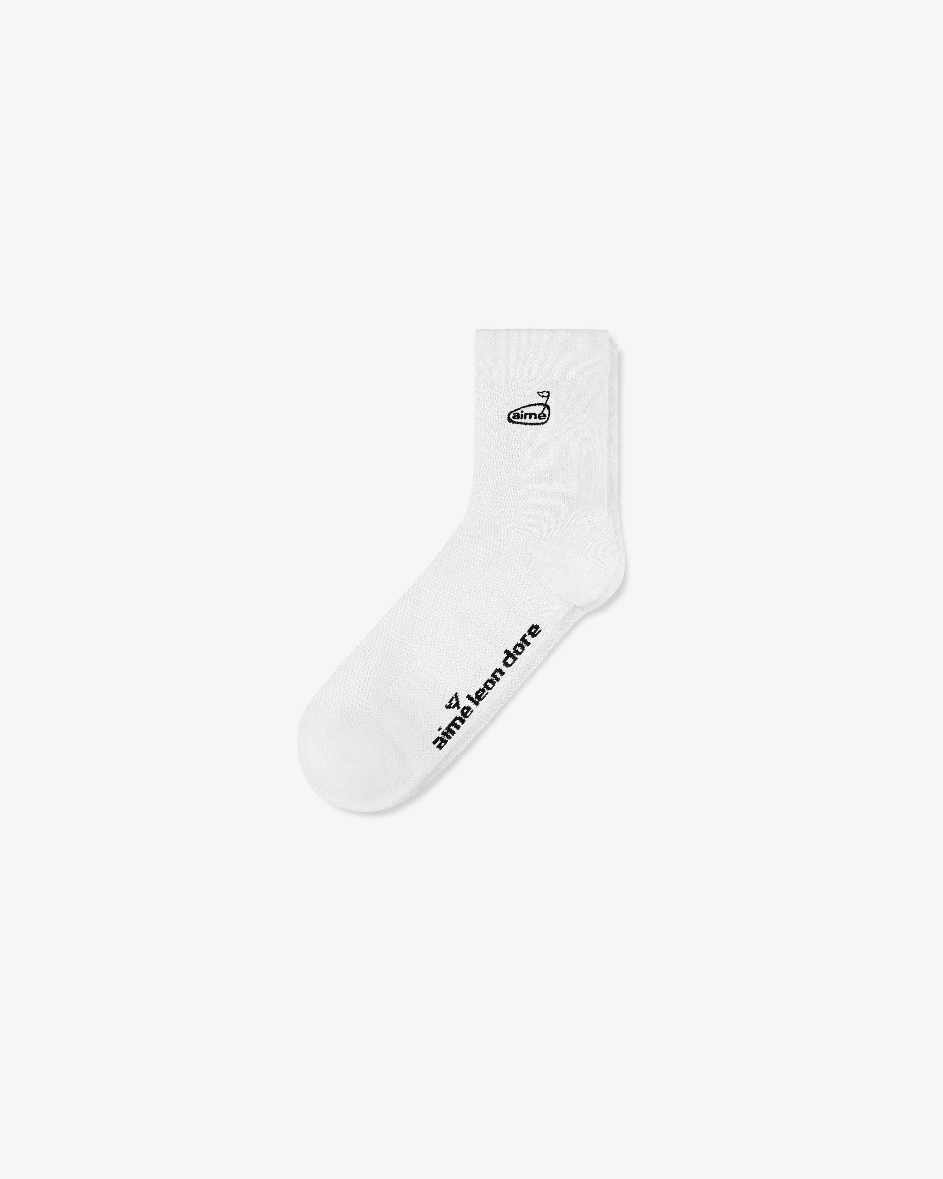 ALD Golf Performance Ankle Sock in white with black text and a small logo near the top and on the side.