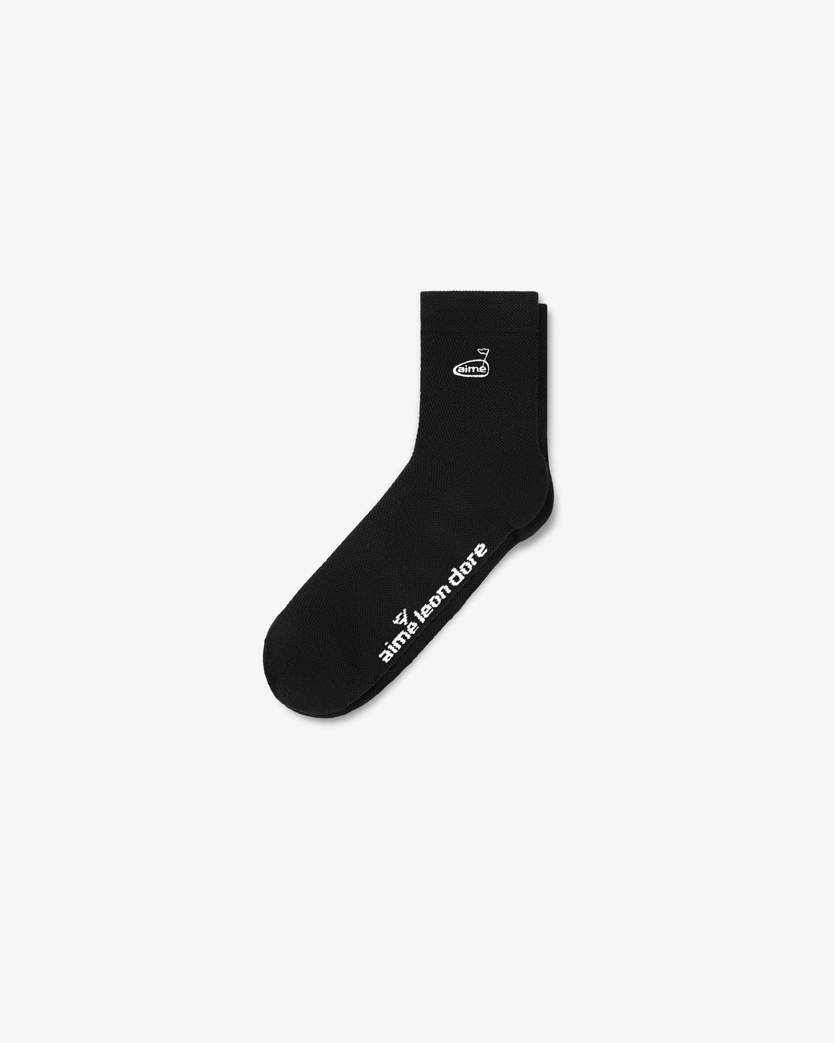 The ALD Golf Performance Ankle Sock is black with a small white logo near the top and Aimé Leon Dore text on the side.