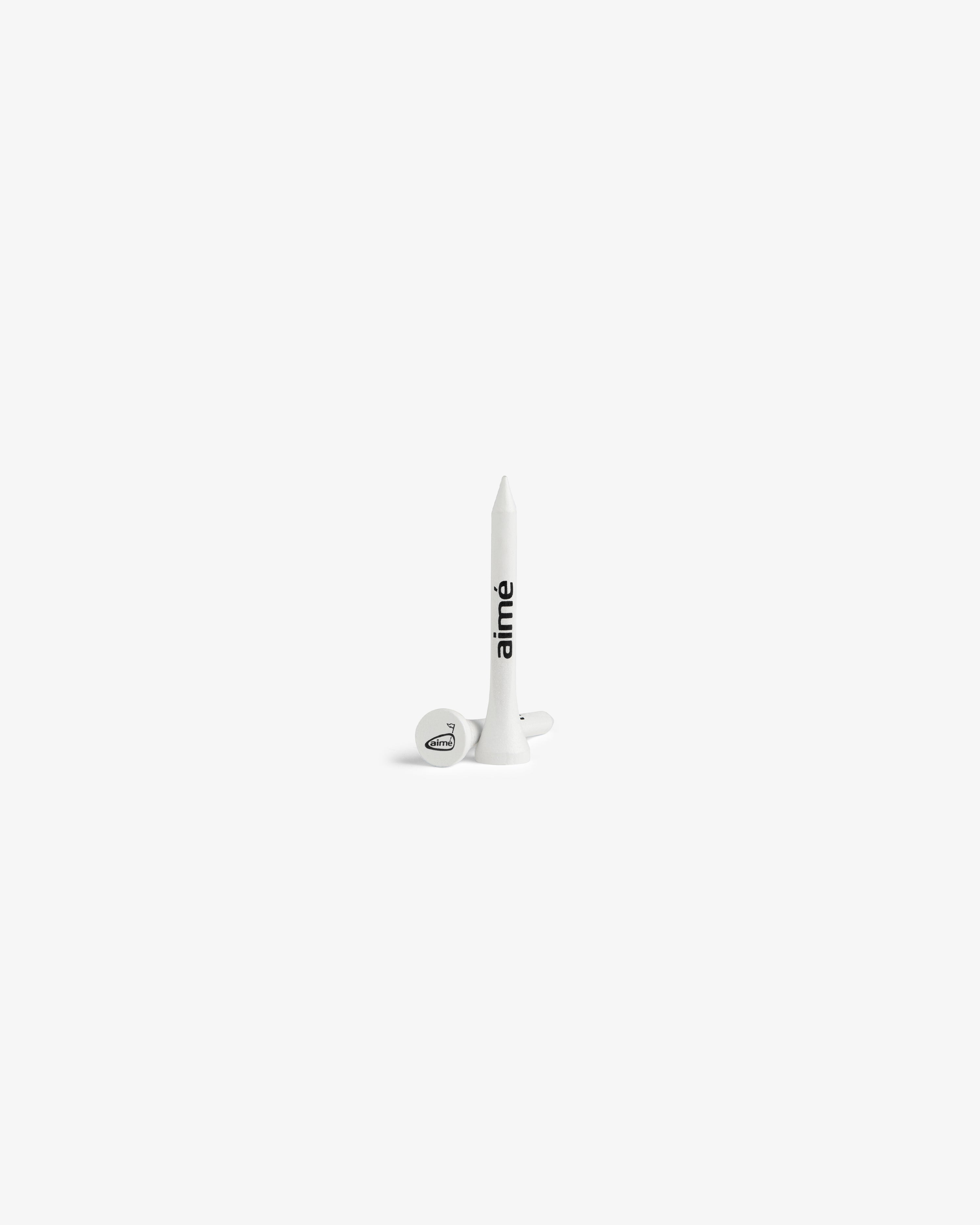 A box of ALD Golf Tees (50 Pack) stands upright with tees next to it on a plain white background.