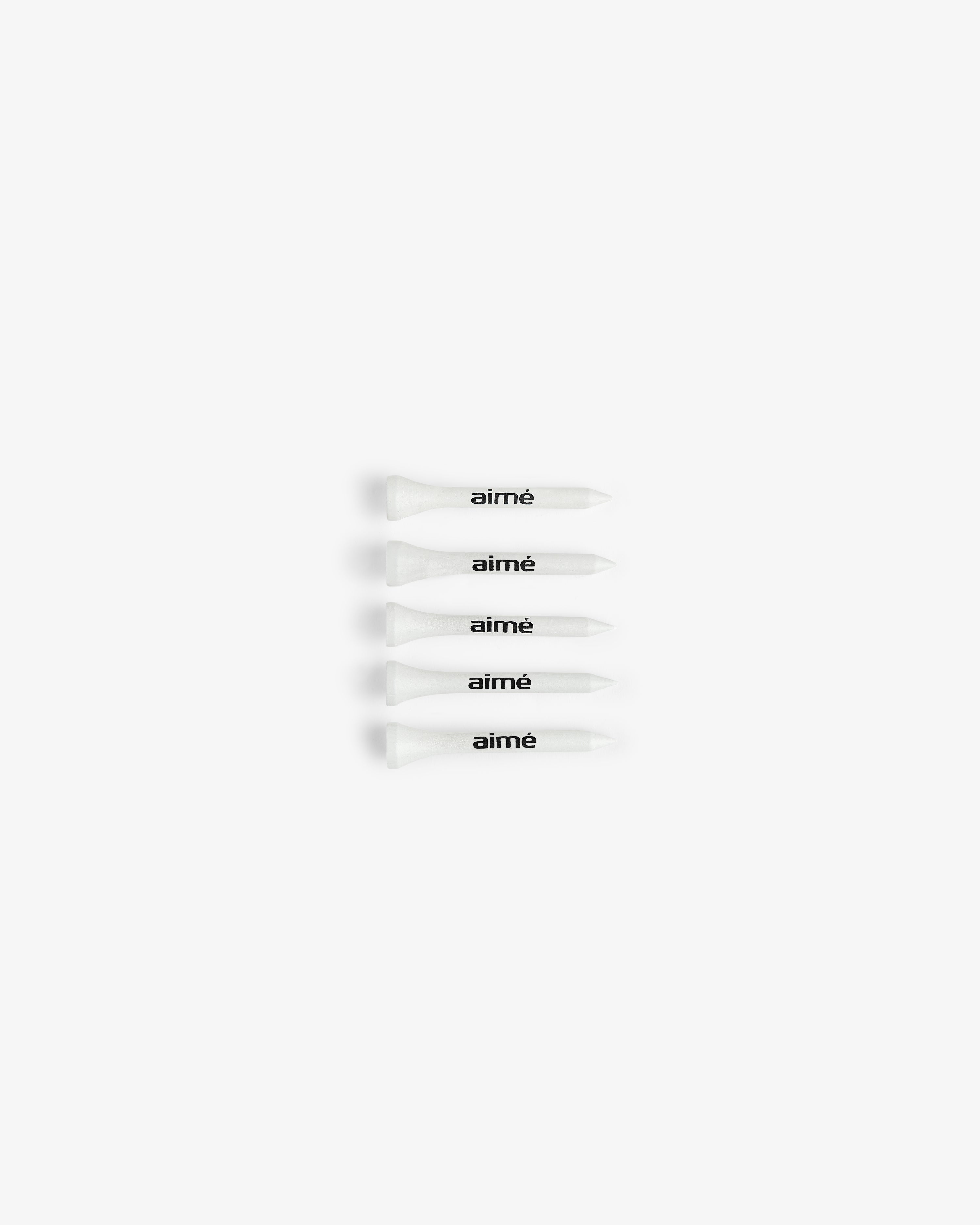 Fifty white ALD Golf Tees with "aimé" in black, arranged horizontally on a white background.
