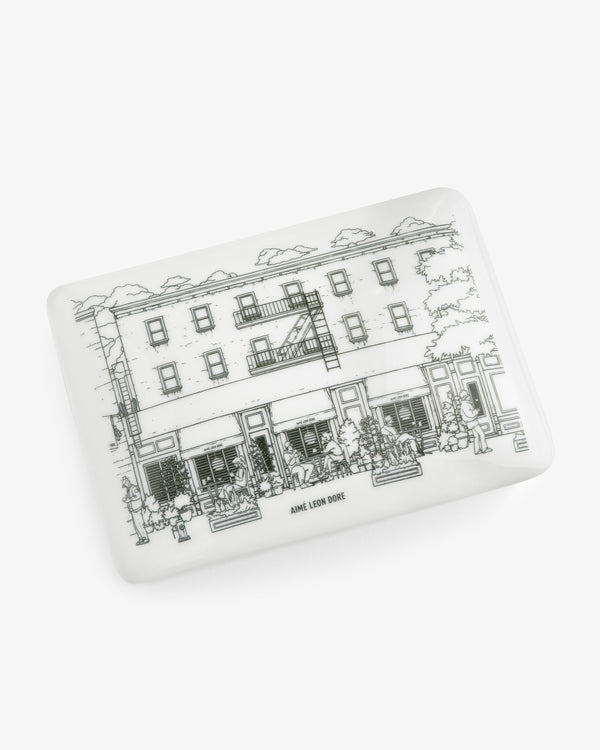 Mulberry Catchall Box: white rectangular tray with a black line drawing of an urban building and Aimé Leon Dore text.