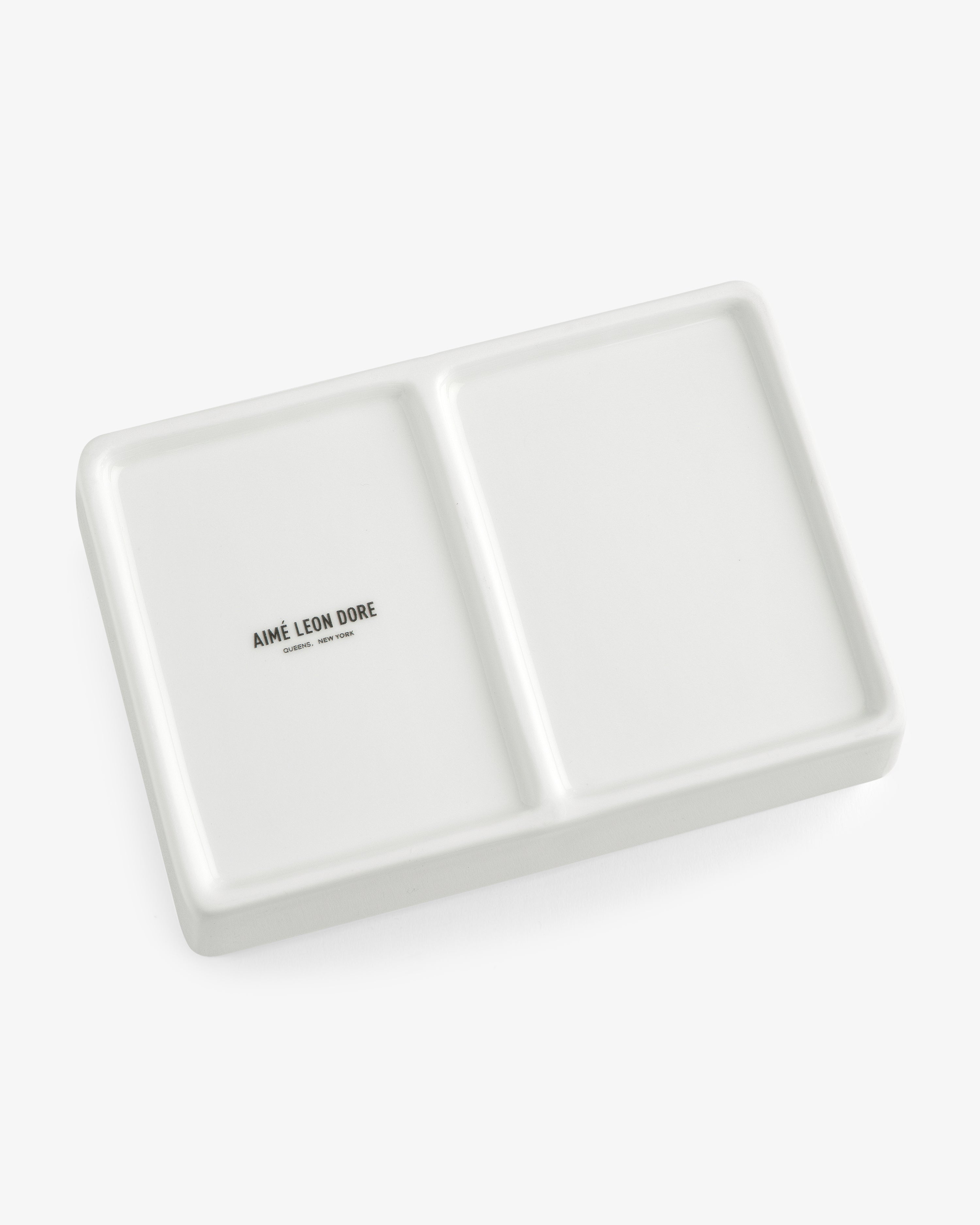Mulberry Catchall Box: rectangular white ceramic tray with two sections and AIMÉ LEON DORE text in one section.