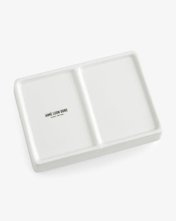 Mulberry Catchall Box: rectangular white ceramic tray with two sections and AIMÉ LEON DORE text in one section.