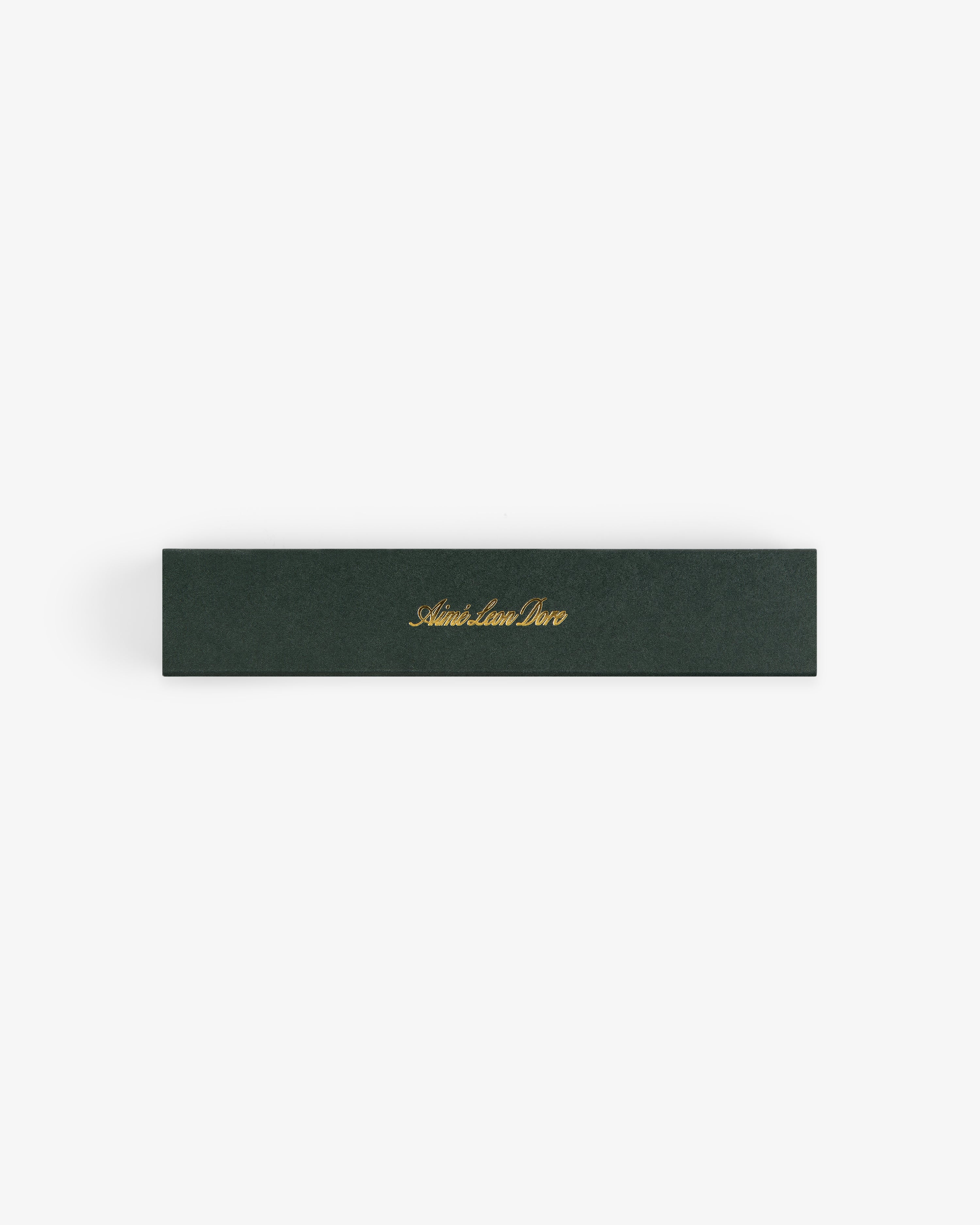 A rectangular dark green box labeled Mulberry Incense in gold cursive, shown on a white background.