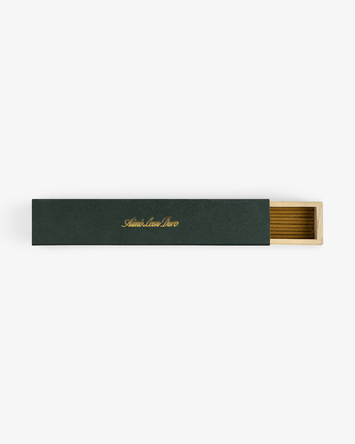 A rectangular green Mulberry Incense box with gold text, partially open to reveal a wooden interior.
