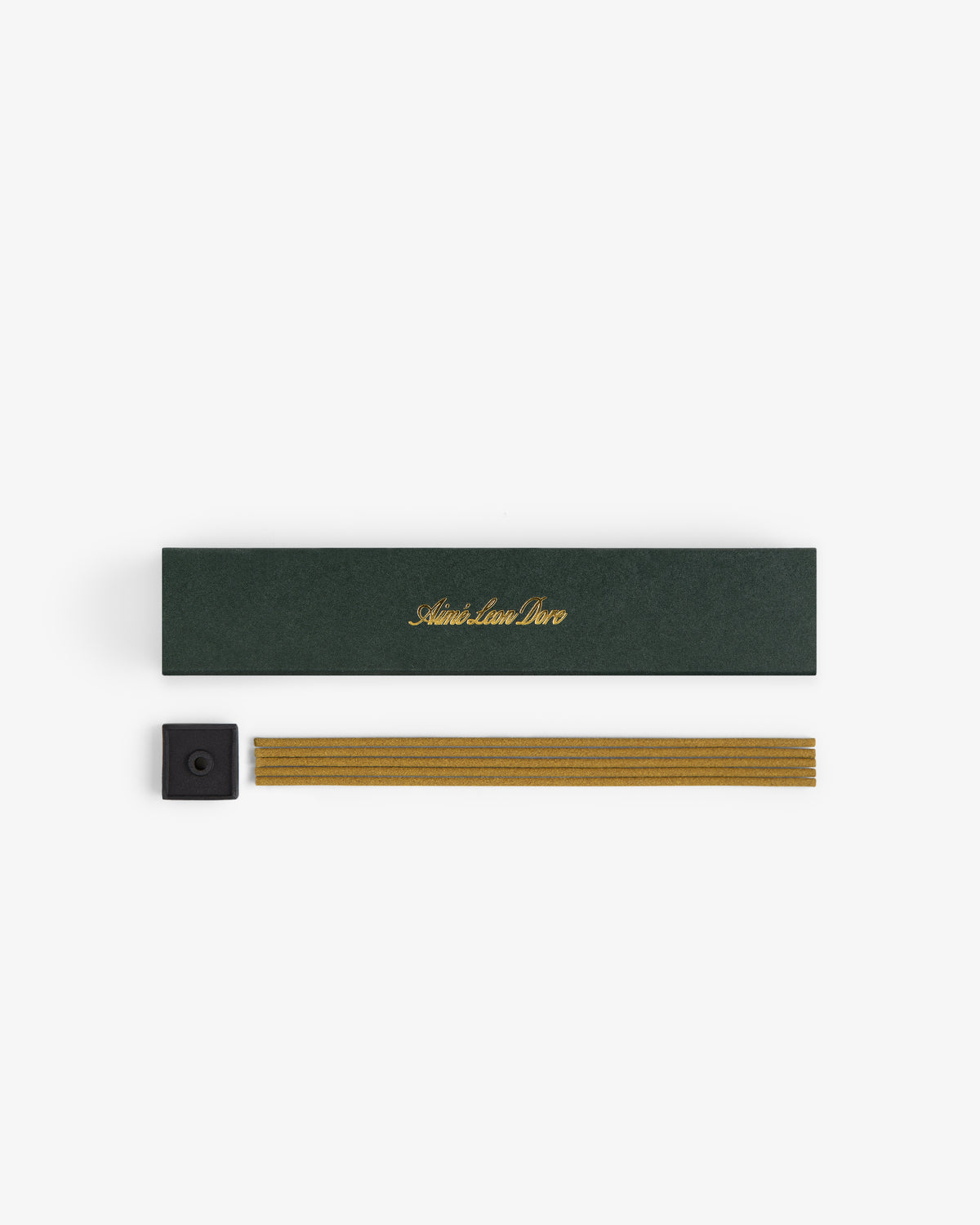 Mulberry Incense: green box with gold text, black holder, and bundled incense sticks on a white background.