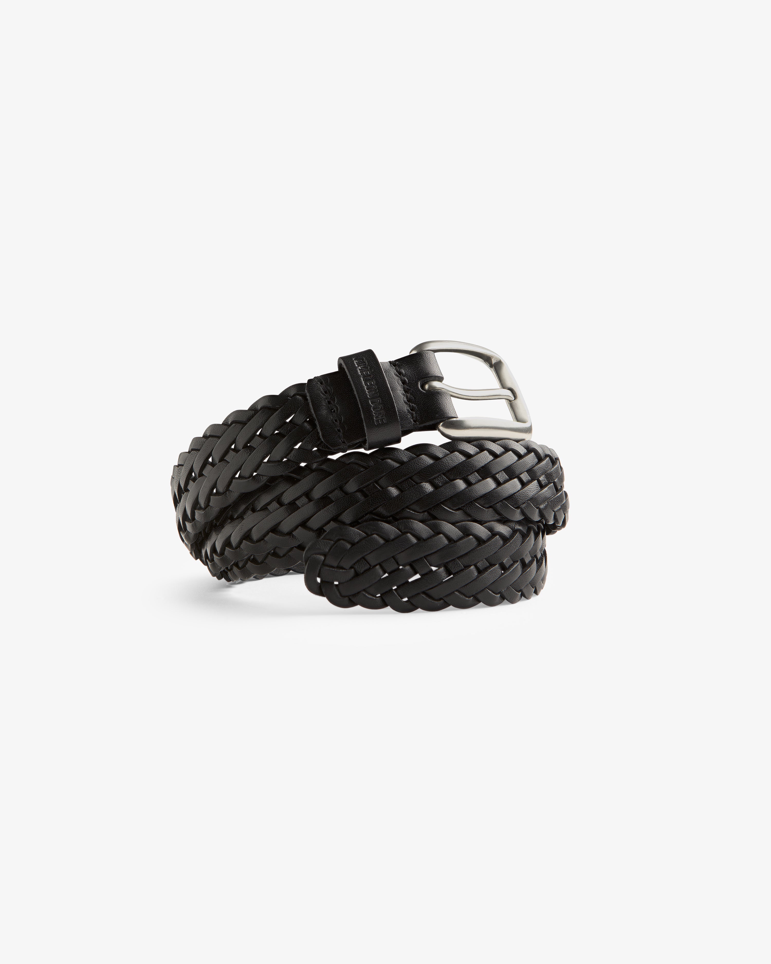 Braided Leather Belt in black with a silver buckle, coiled on a plain white background.
