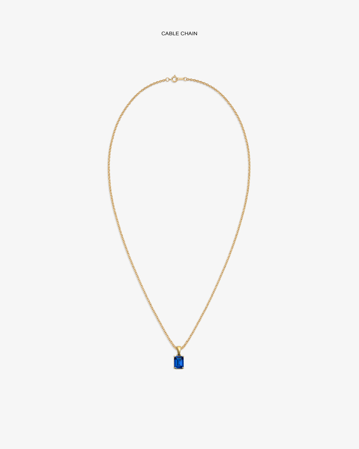 14Kt Gold Gemstone Pendant with rectangular blue stone on gold cable chain, displayed on white background.