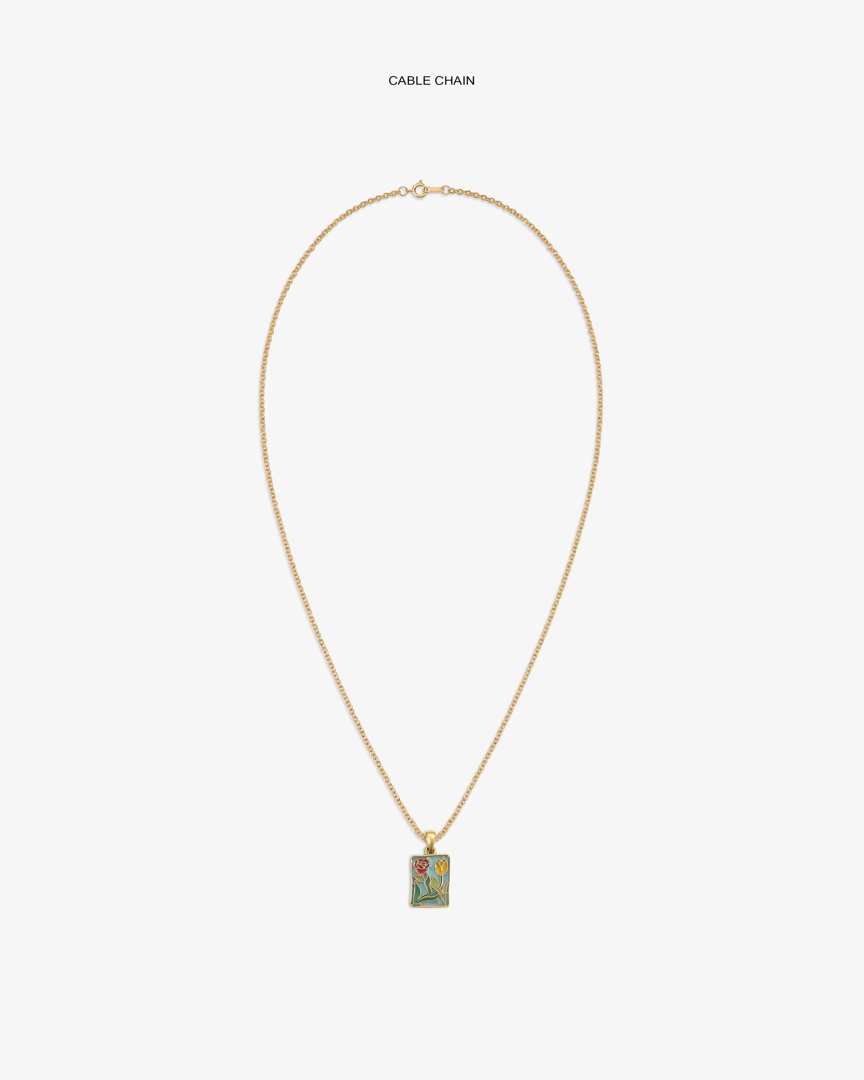 14Kt gold cable chain necklace with a colorful stained glass crest pendant.