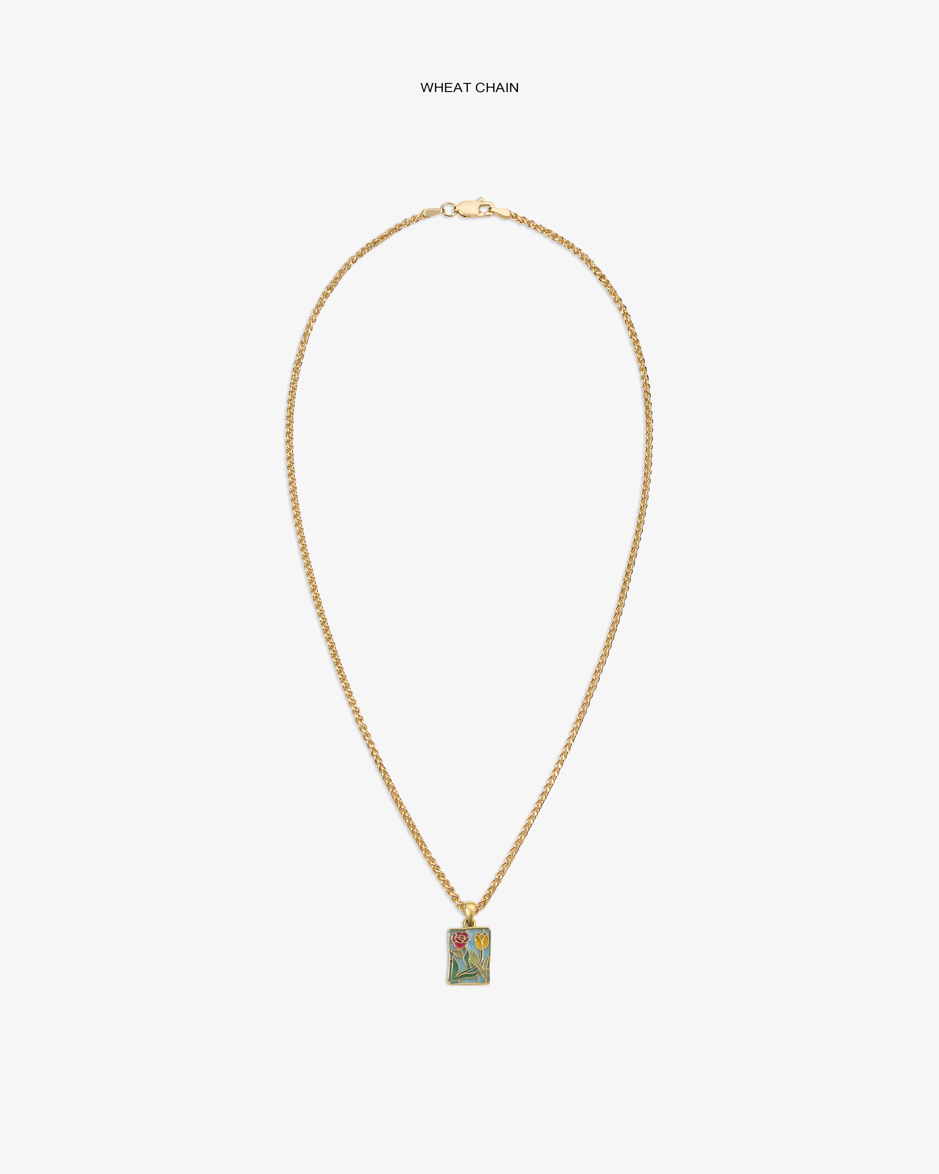 14Kt Gold Stained Glass Crest Pendant on a wheat chain, rectangular with a floral design, shown on white background.