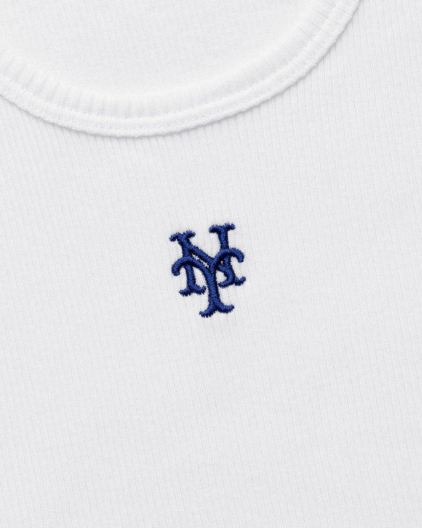 Close-up of the Mets Tank Top, a white ribbed shirt featuring a blue New York Mets logo embroidered on the chest.