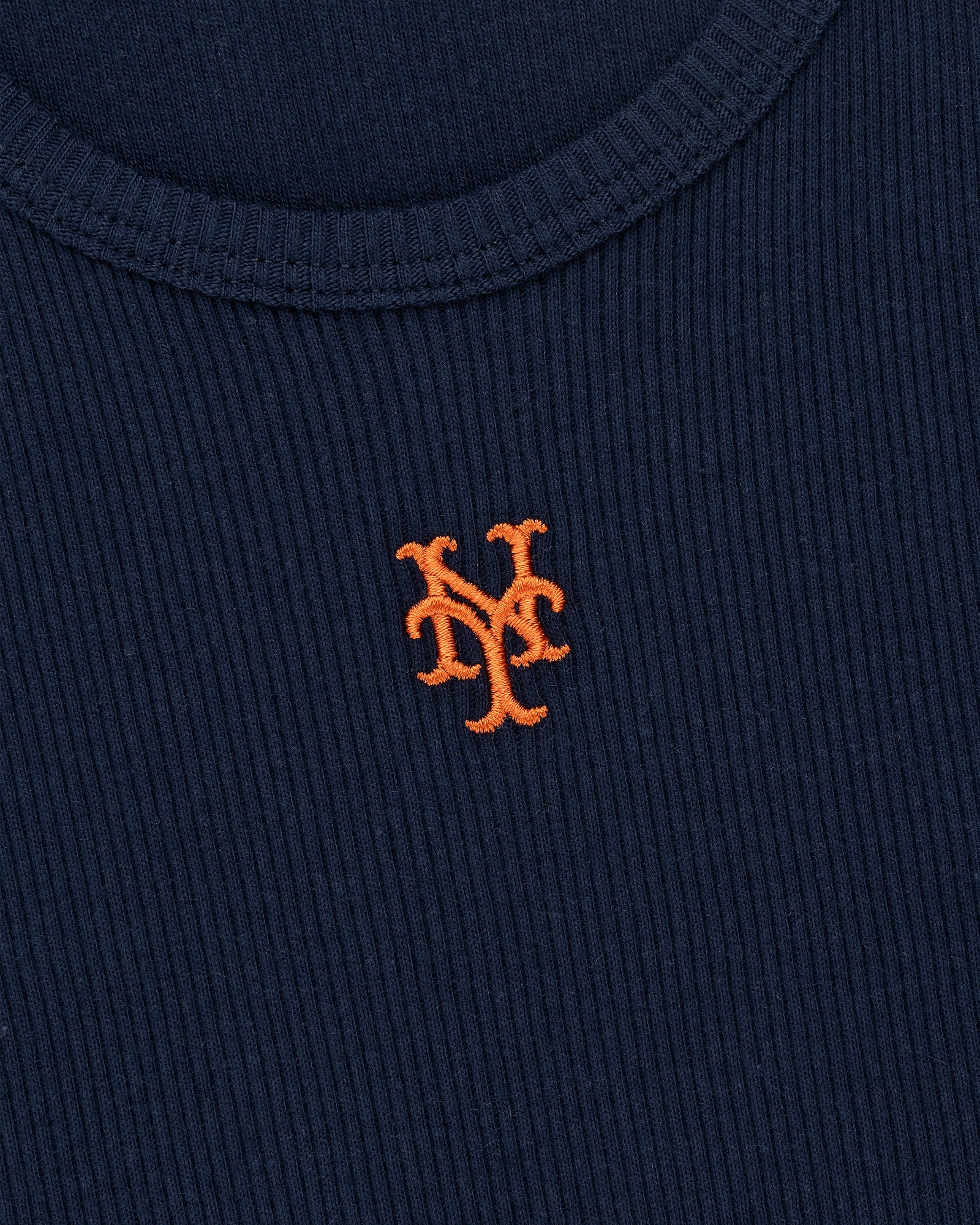 The Mets Tank Top features navy blue ribbed fabric with an orange embroidered interlocking NY logo centered.
