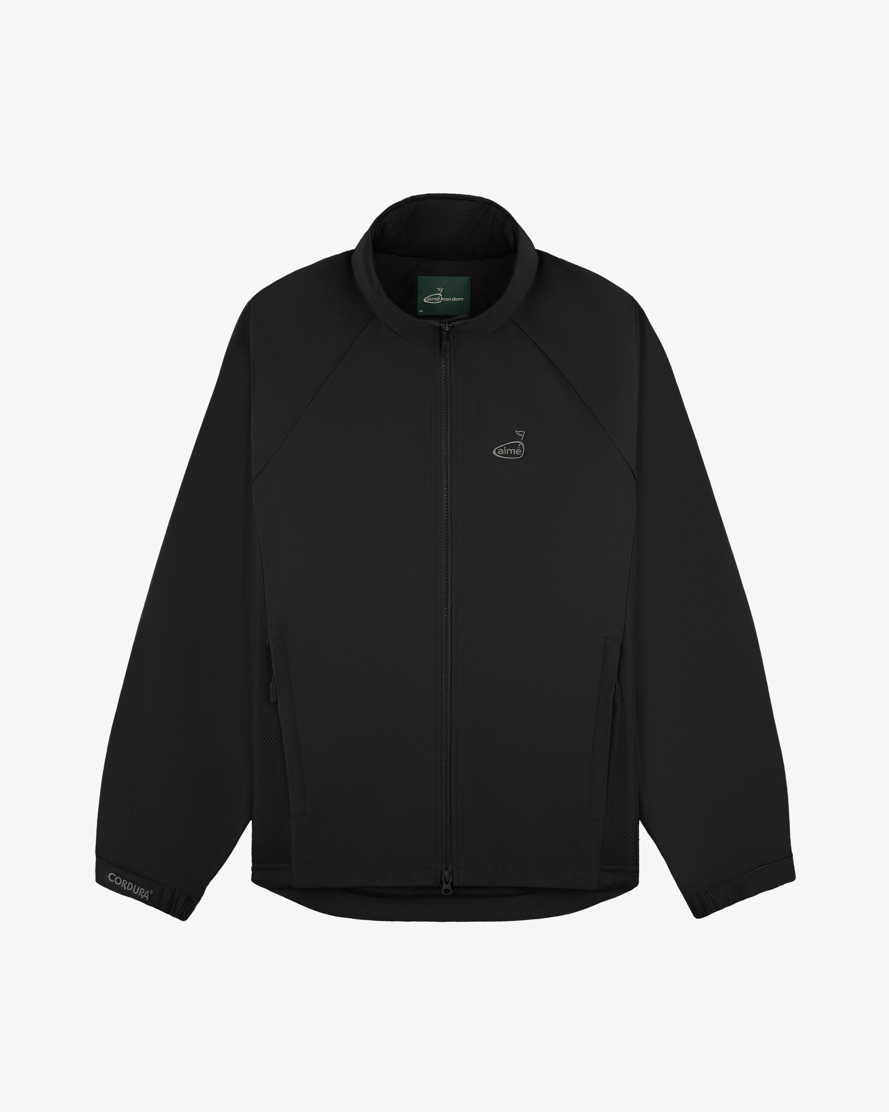 ALD Golf Cordura Tips Jacket—black zip-up with long sleeves, chest logo, and zippered side pockets on white background.
