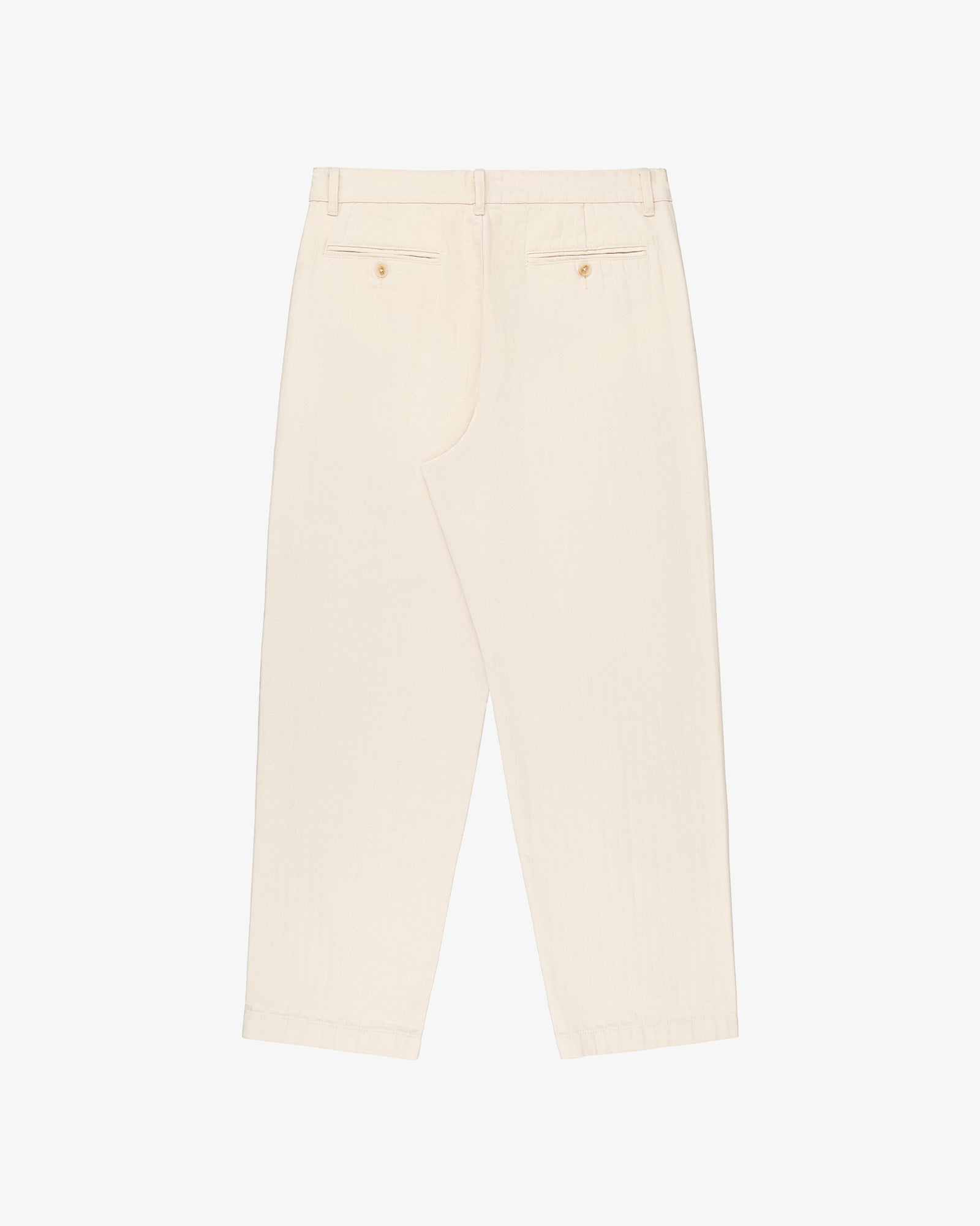 Back view of Single Pleated Pant in off-white with belt loops & two buttoned back pockets, laid flat on white background.