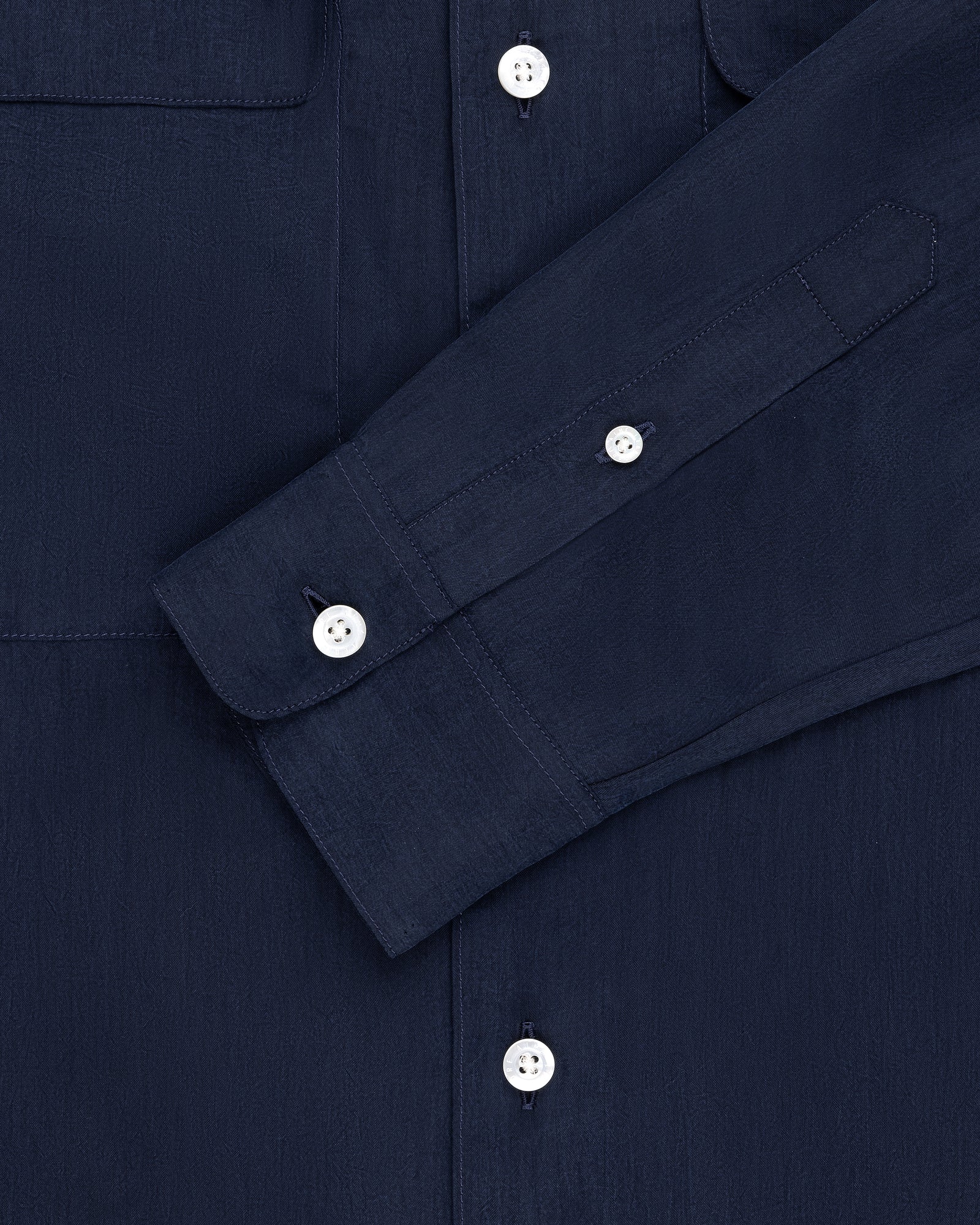 Collarband Safari Shirt in navy blue with long sleeves and white buttons, displayed flat on a white background.