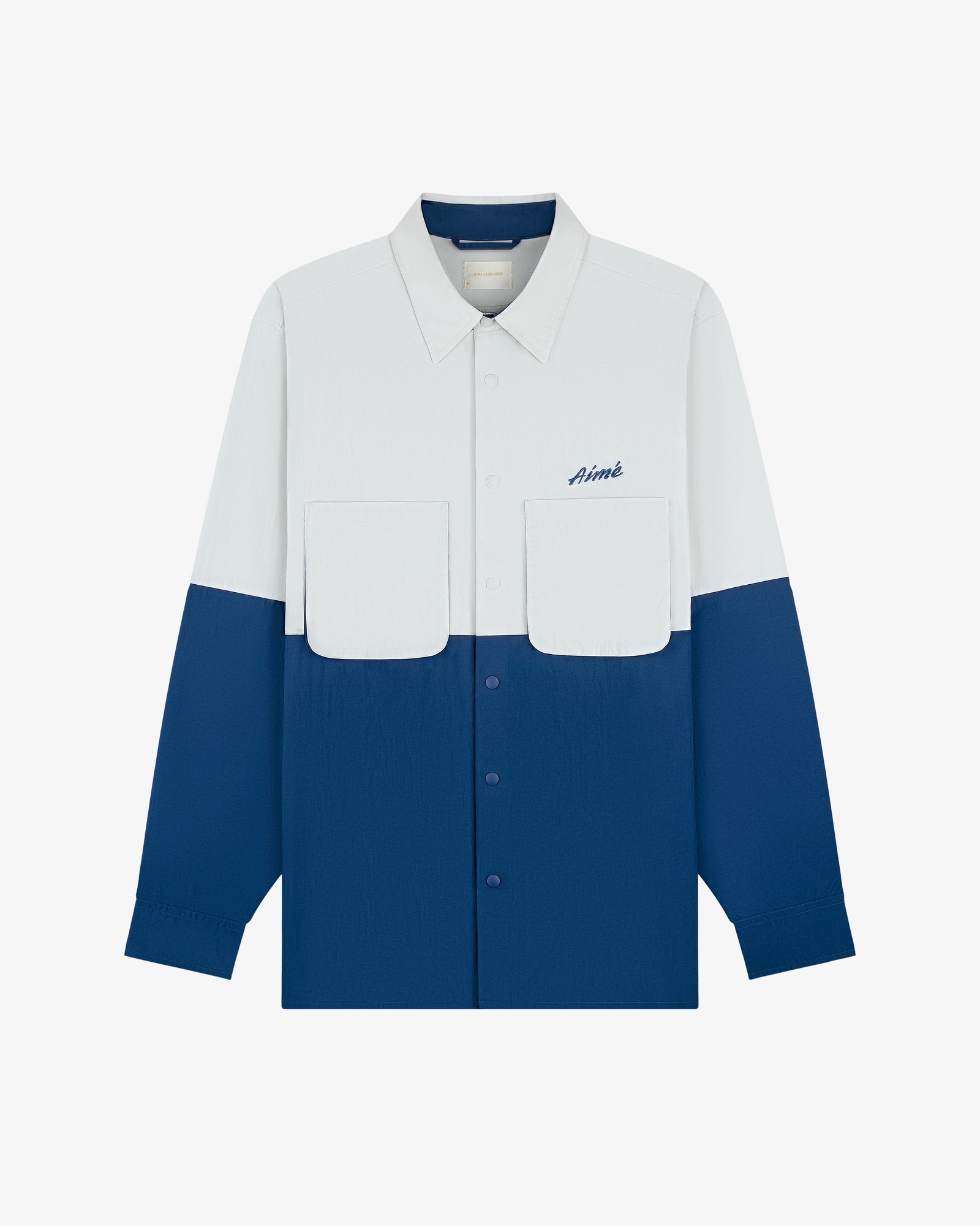 Colorblock Sport Shirt: White top, blue bottom, 2 front pockets, Aimé logo embroidered on left chest.