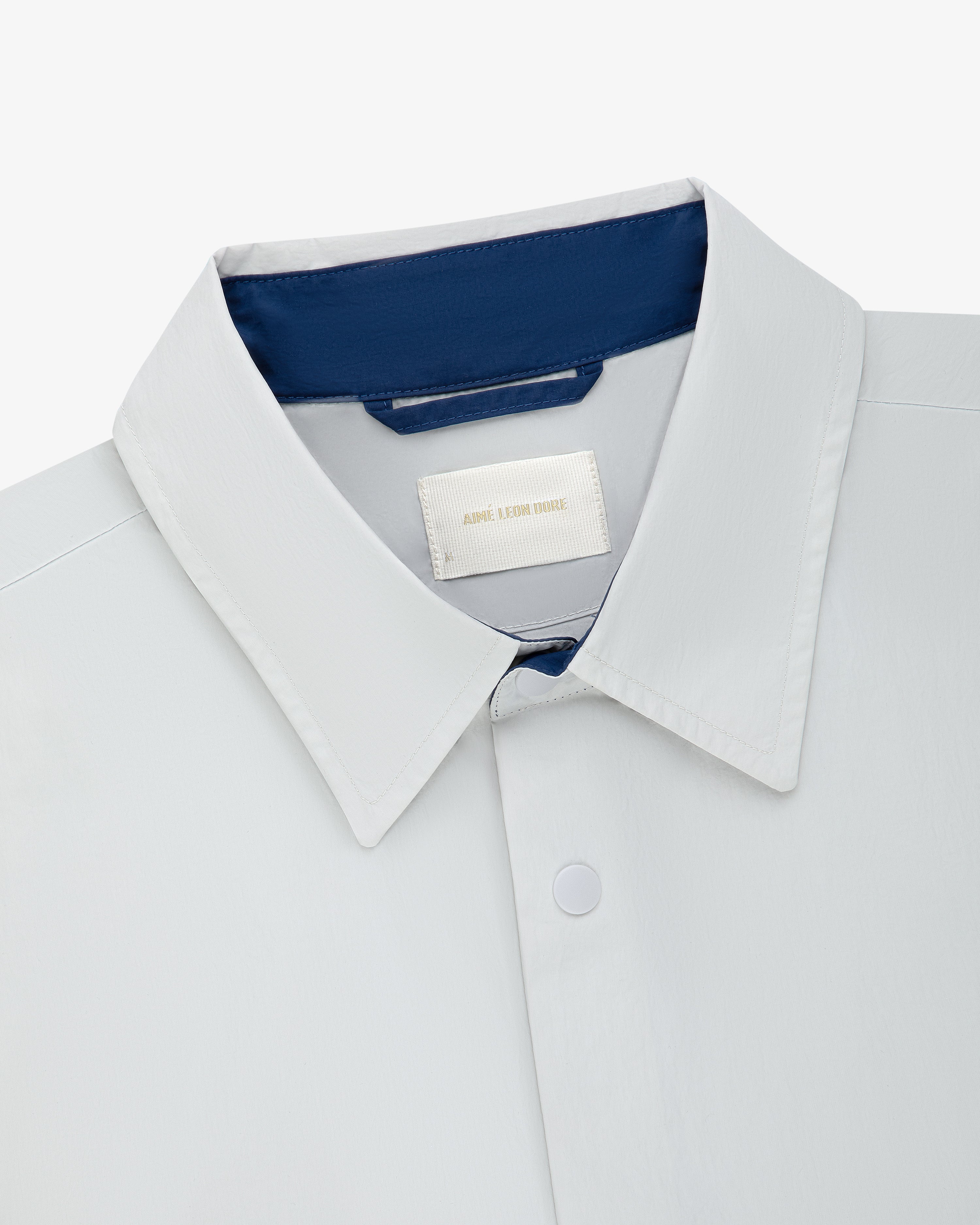 Colorblock Sport Shirt with white collar, blue inner lining, and a blank label inside the collar.