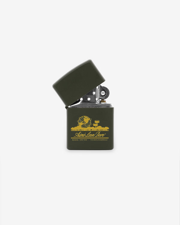 A green Unisphere Zippo lighter with yellow text stands open and upright on a white background.
