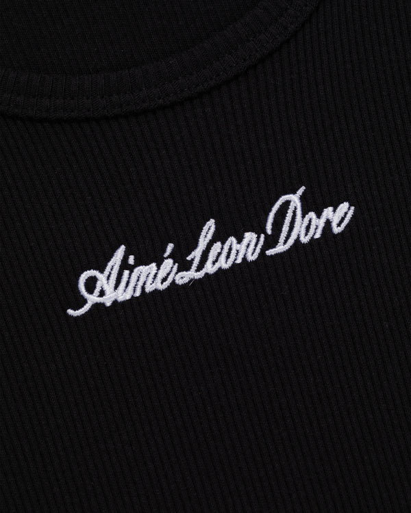 Close-up of black ribbed Embroidered Logo Tank Top with Aimé Leon Dore in white script.