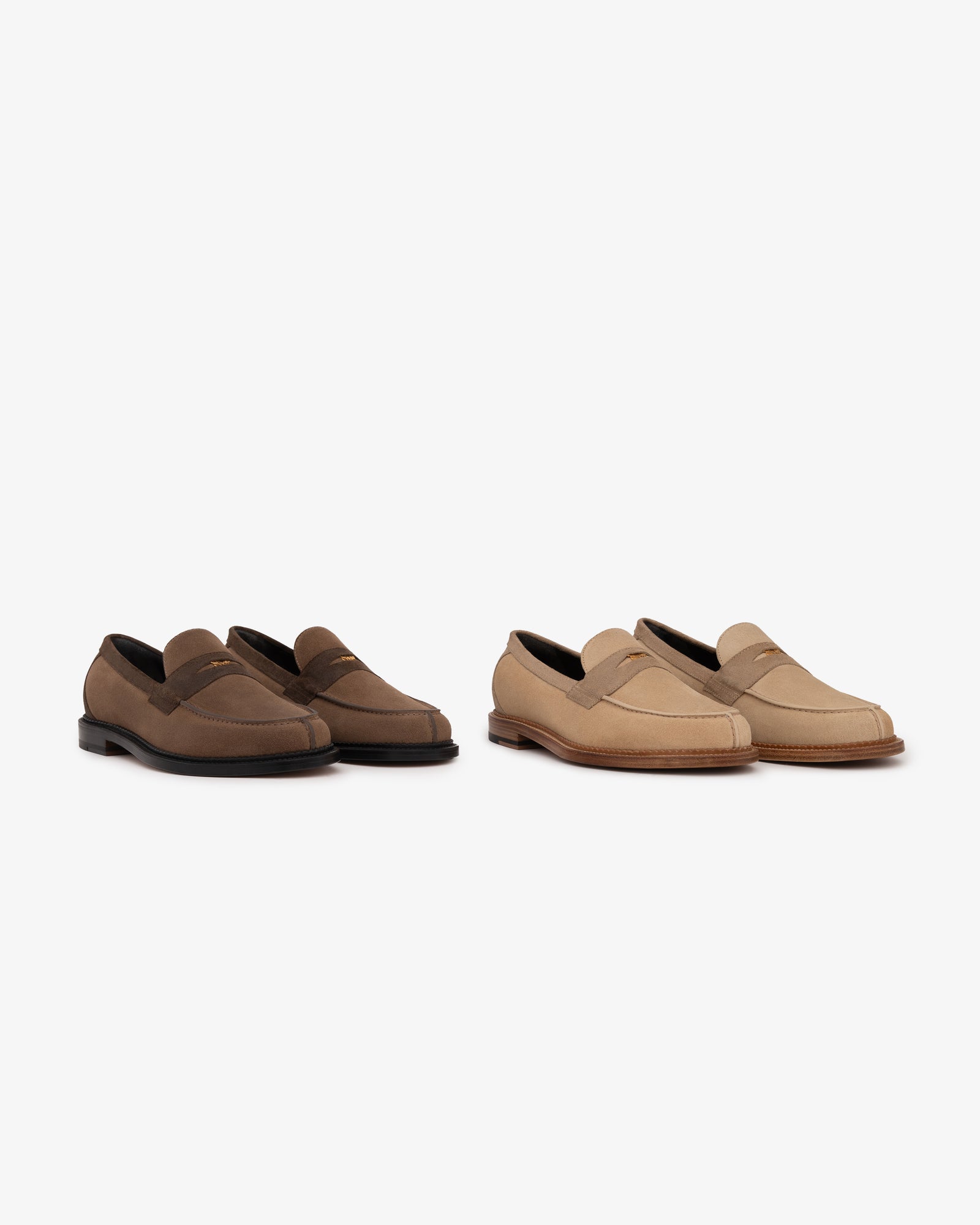 Two Suede Queens Crest Loafers—one dark brown with black soles, one tan with tan soles—on a white background.