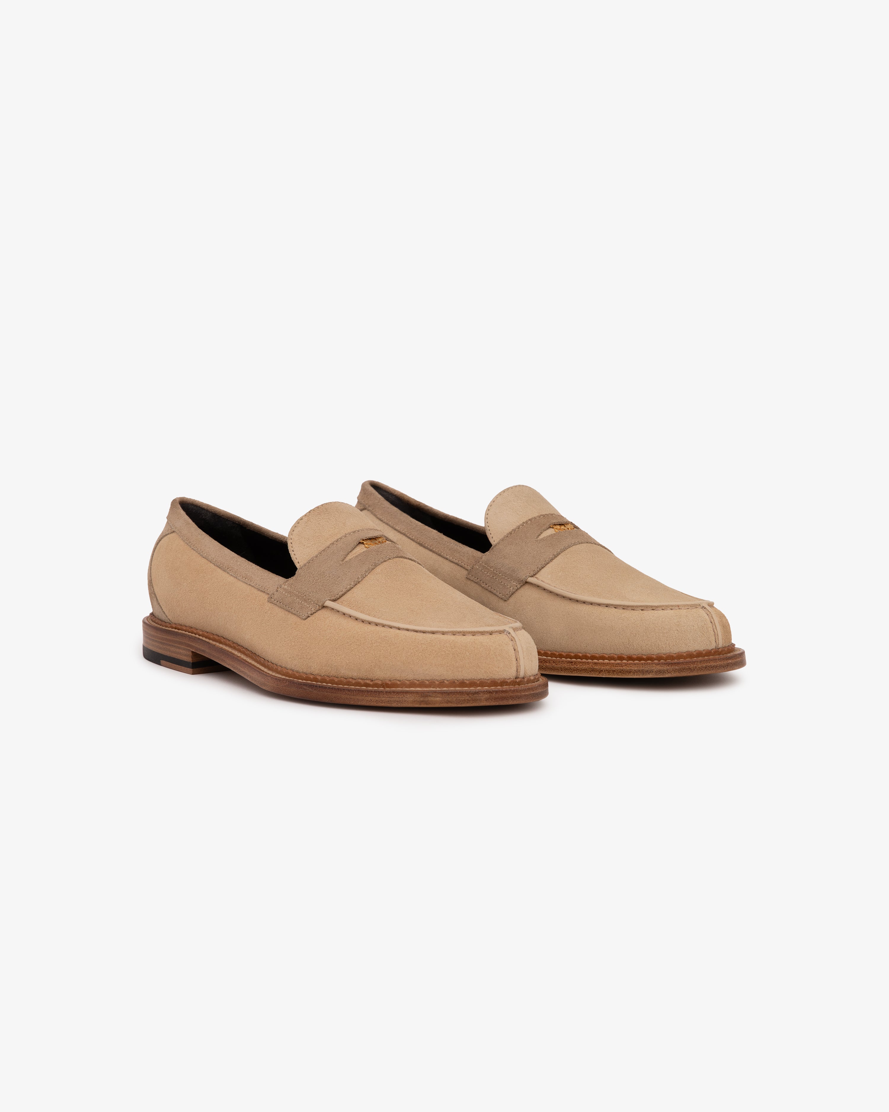 Suede Queens Crest Loafers in tan with brown soles, angled right on a white background.