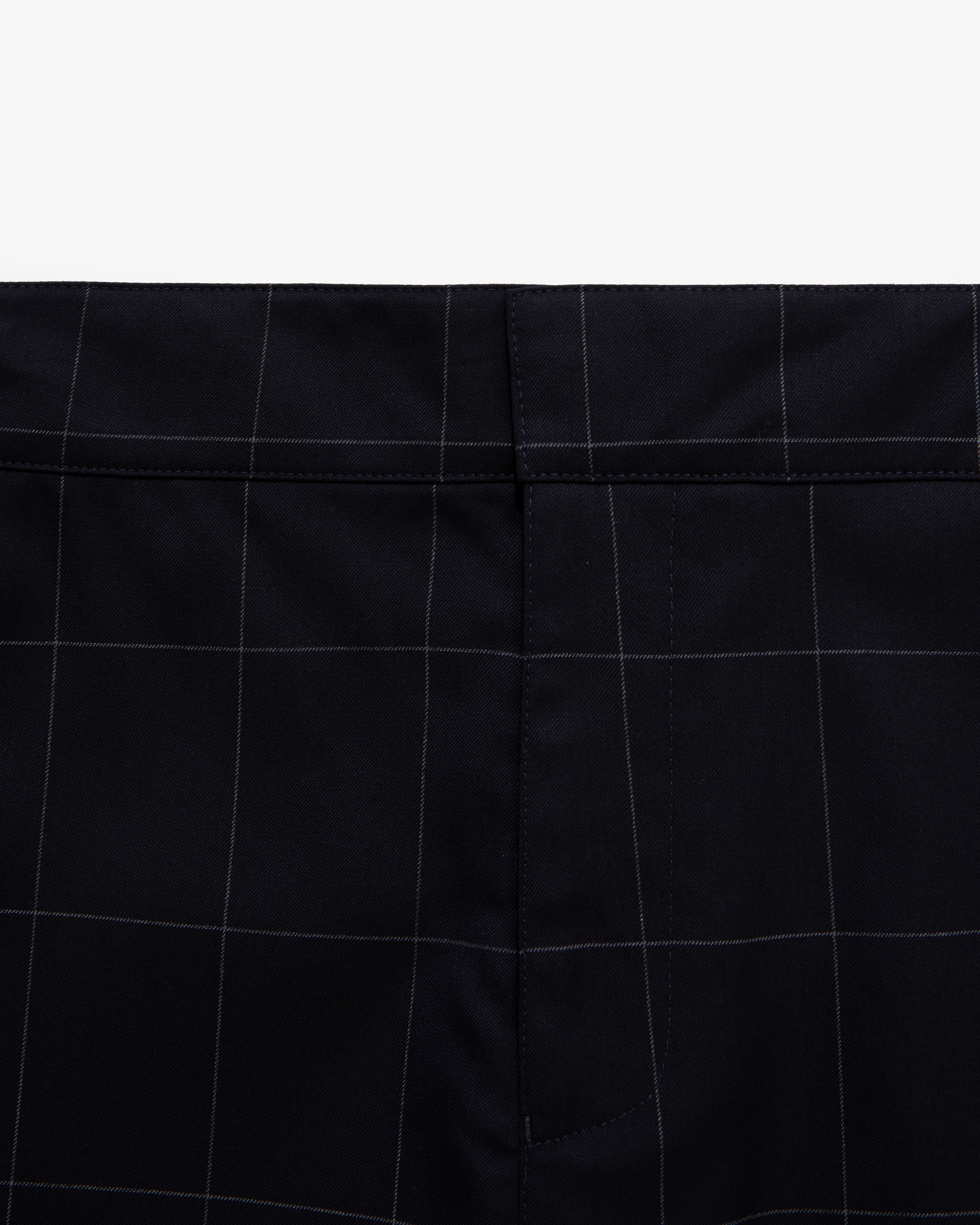Close-up of Windowpane Elasticated Waist Suit Trouser in navy with white check pattern and waistband seam.