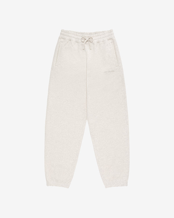Tonal Logo Sweatpants in light beige with elastic waistband, drawstring, side pockets, and elasticated cuffs.