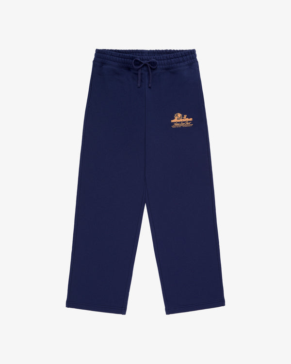 Unisphere Sweatpants in navy blue with a drawstring waist and small orange logo on the left thigh, laid flat.