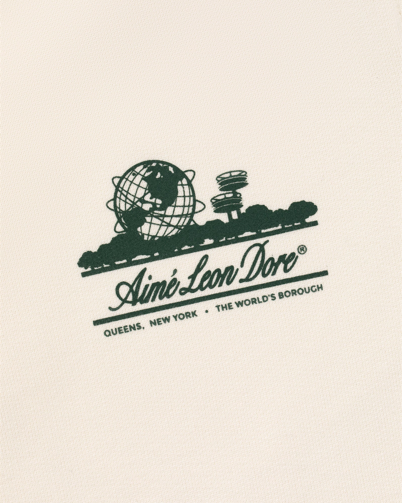 Cream fabric Unisphere Sweatpants with green Unisphere graphic and text: Aimé Leon Dore, Queens, New York, The World's Borough.