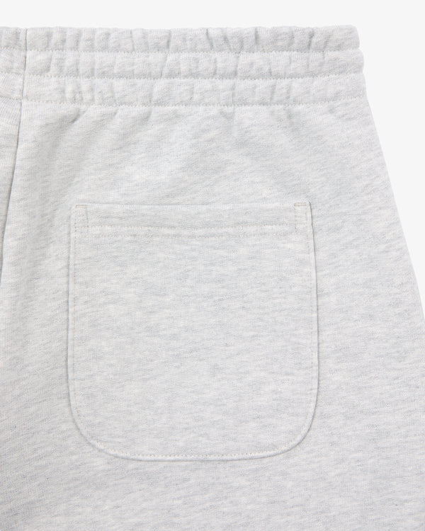 Close-up of the back pocket and waistband on Micro Logo Sweatpants in light gray with an elastic waist.