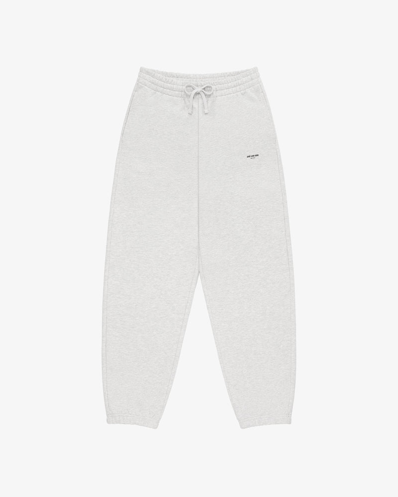 Micro Logo Sweatpants in light gray with elastic waistband, drawstring, and small text logo on the left thigh.