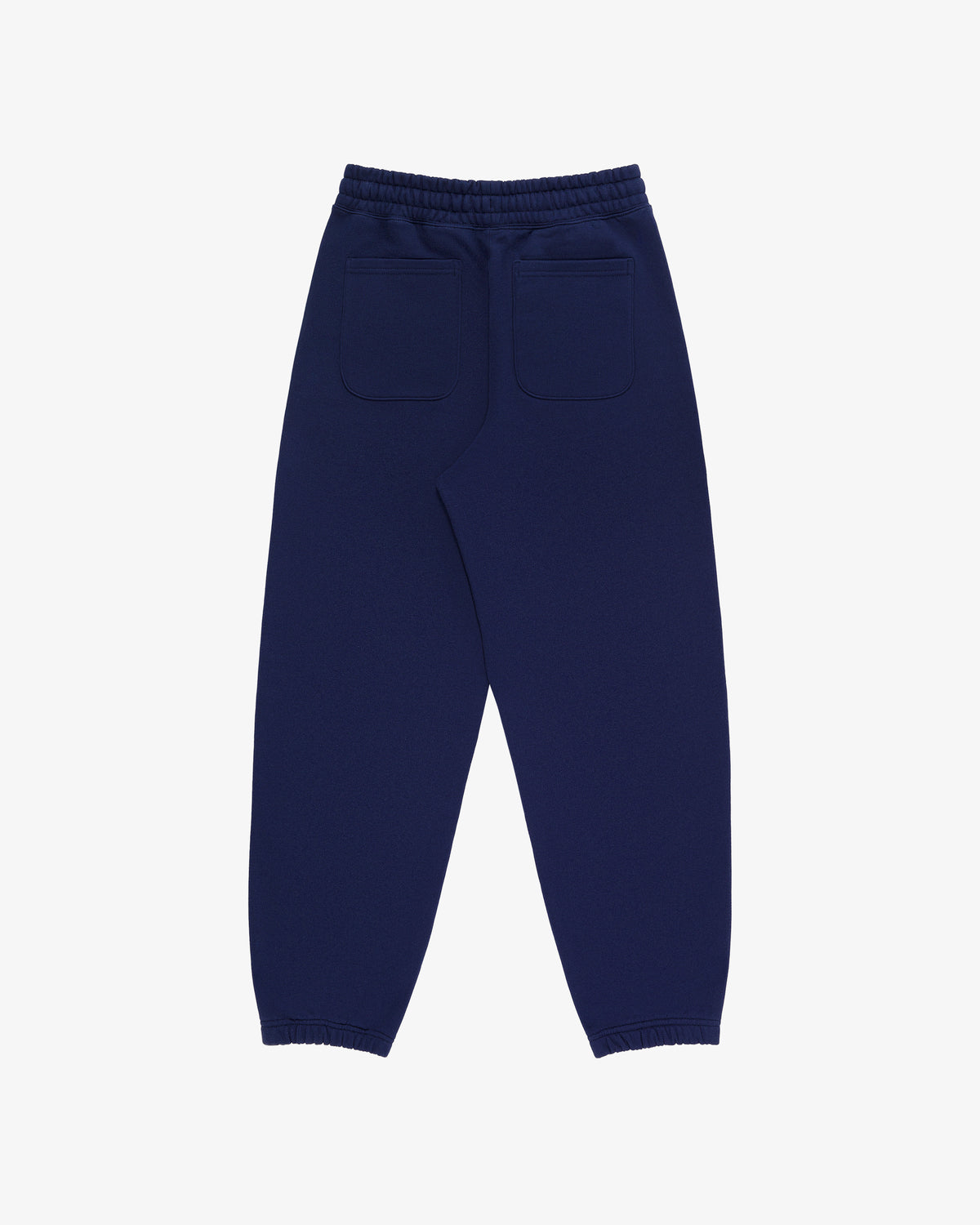 Tonal Logo Sweatpants in navy blue with elastic cuffs, waistband, and two back pockets shown from the back.