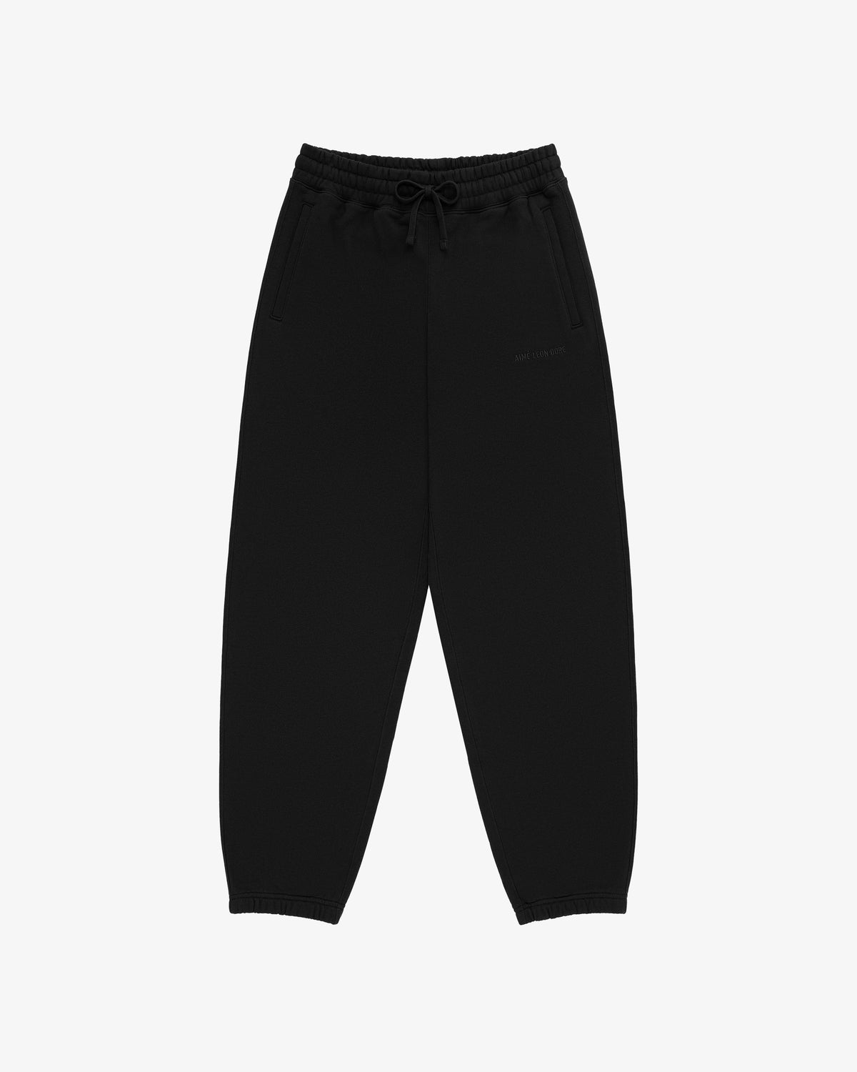 Tonal Logo Sweatpants with elastic waistband, drawstring, and side pockets shown on a white background.