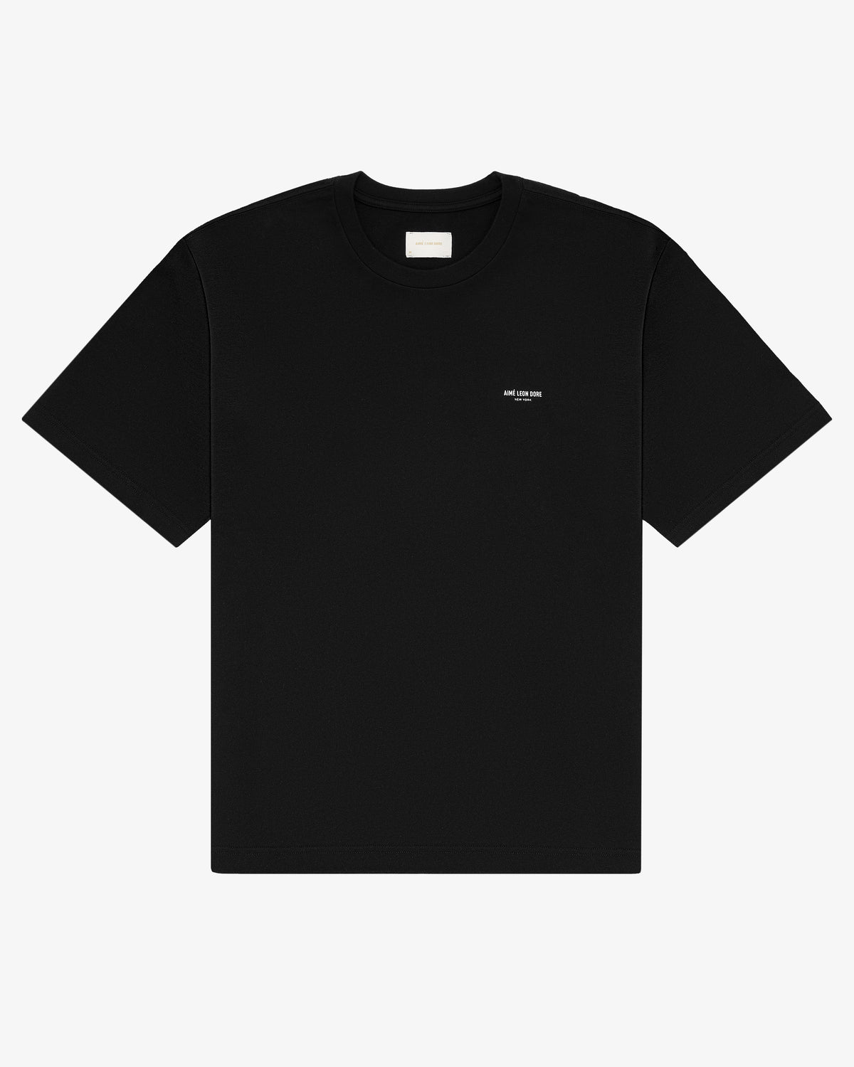 Micro Logo Tee: Black short-sleeve shirt with small white logo on left chest, shown on plain white background.
