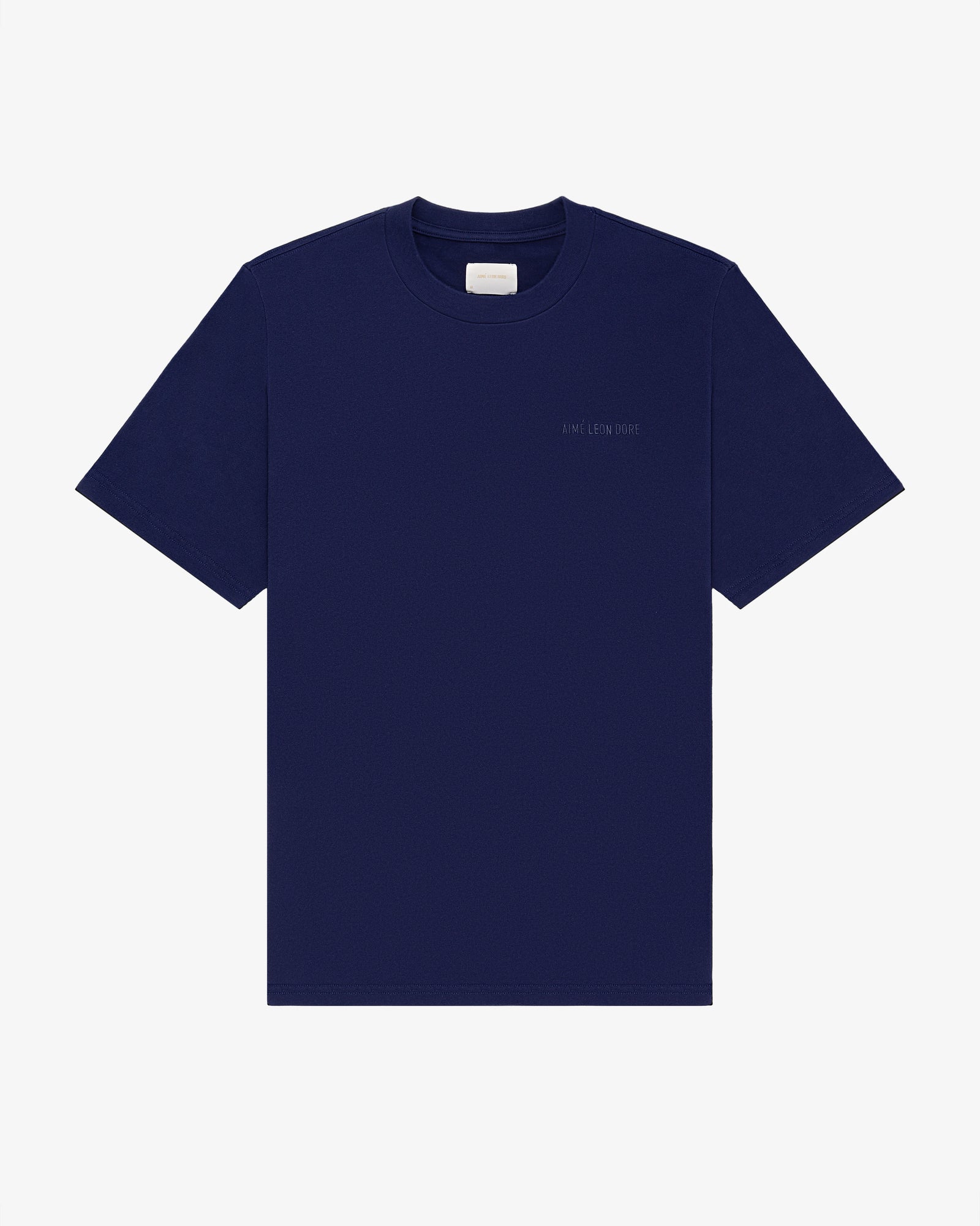 Navy Tonal Logo Tee, short sleeves, with a small white label inside the collar.