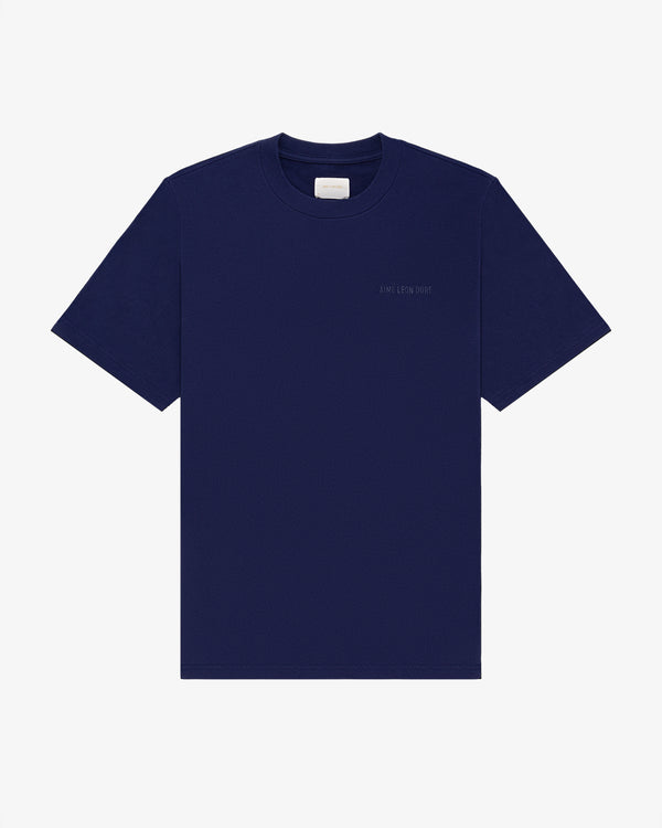 Navy Tonal Logo Tee, short sleeves, with a small white label inside the collar.