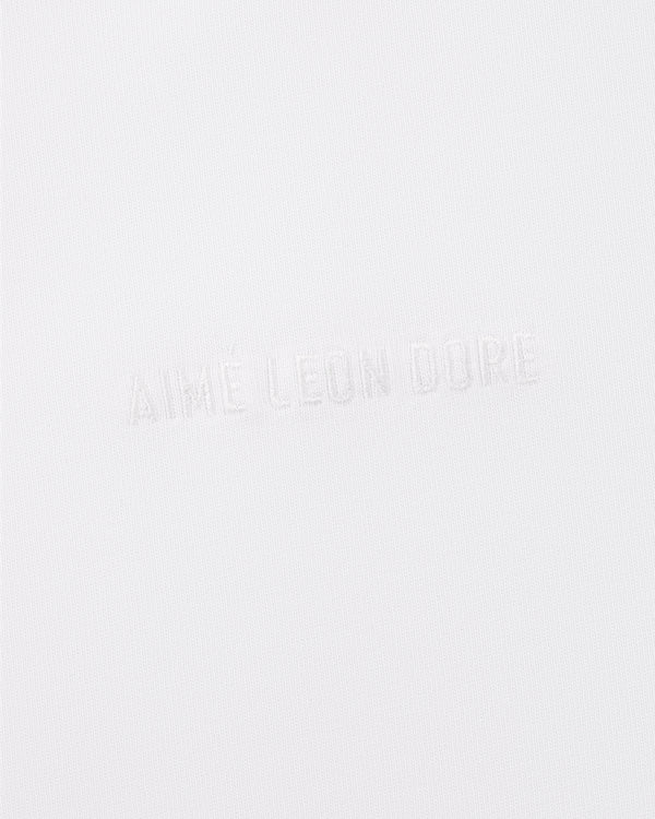Long-Sleeve Tonal Logo Tee in white with subtle AIMÉ LEON DORE embossing for a minimal, clean look.