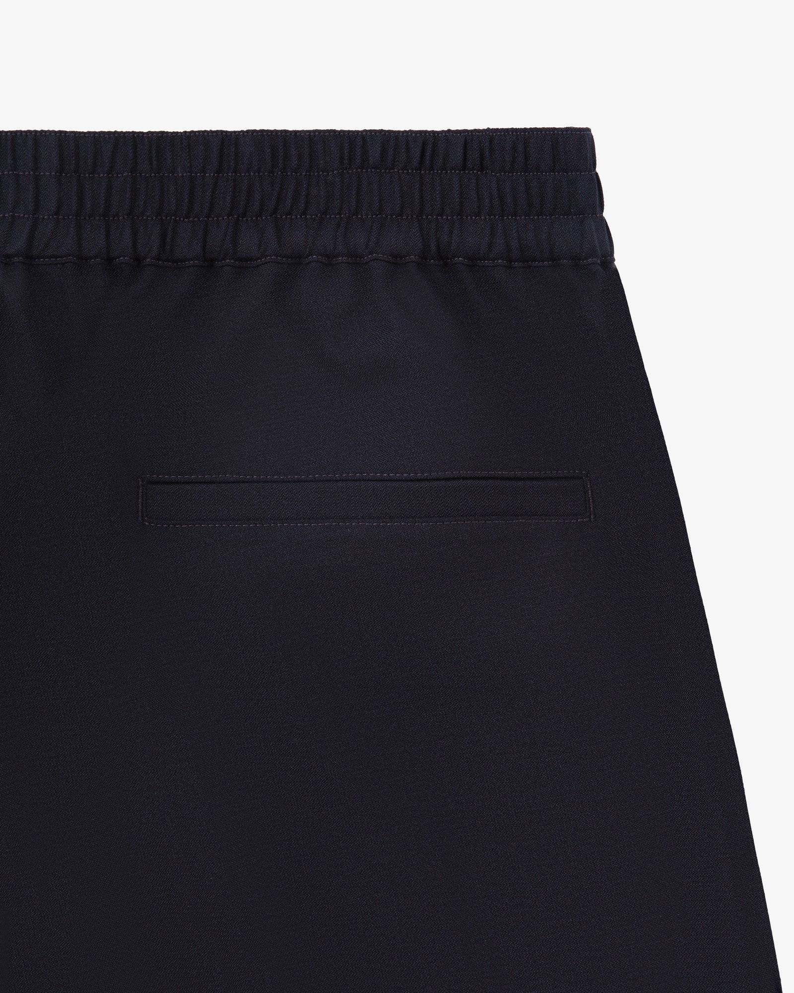 Close-up of the back of Tropical Wool Elasticated Waist Suit Trouser with an elastic waistband and single welt pocket.