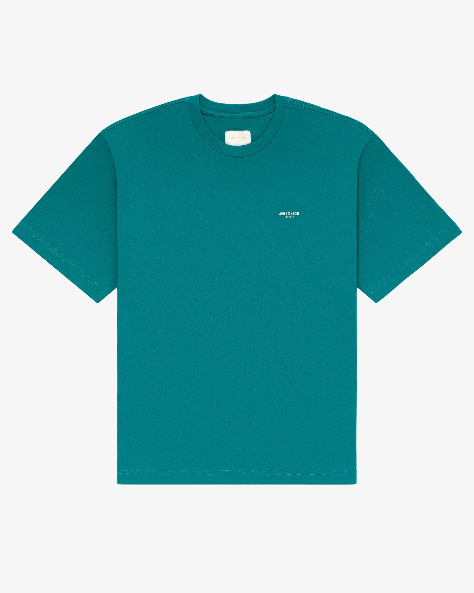 Micro Logo Tee in teal with a small white text logo on the front, shown against a plain white background.