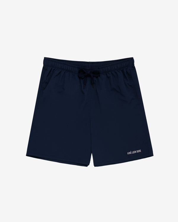 Core Nylon Short in navy with drawstring waist and AIMÉ LEON DORE text on the lower left leg.