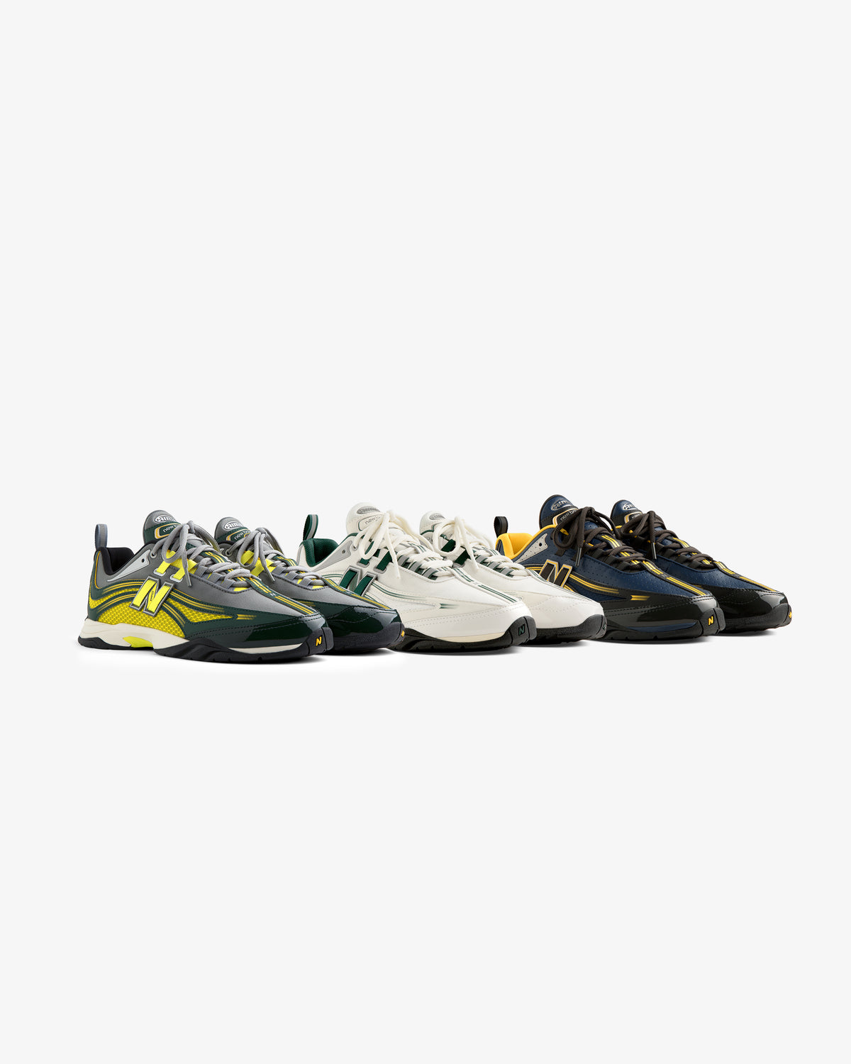 Five pairs of ALD / New Balance RC56 sneakers in various colors are lined up side by side on a white background.