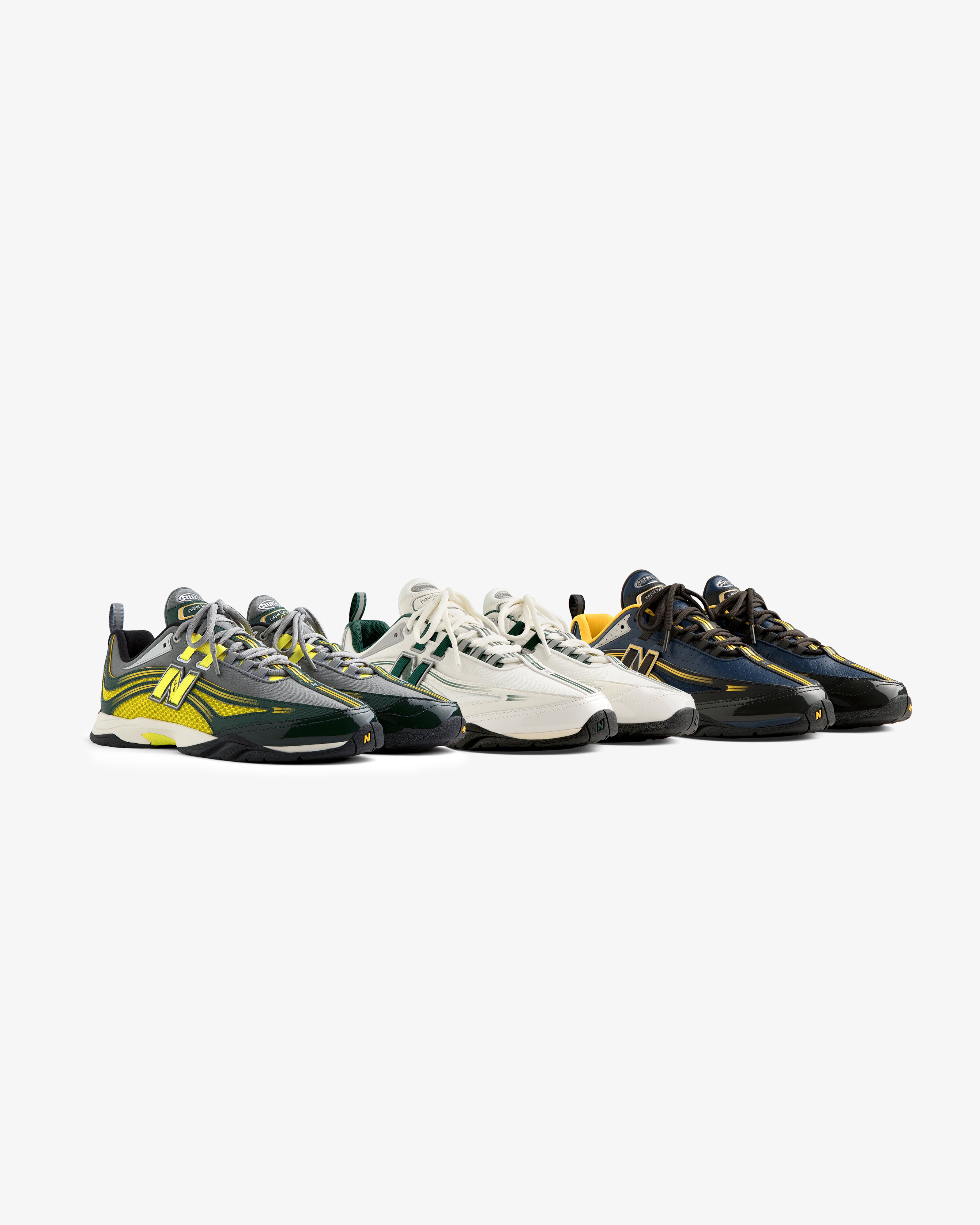 Five pairs of ALD / New Balance RC56 sneakers in various colors are lined up side by side on a white background.
