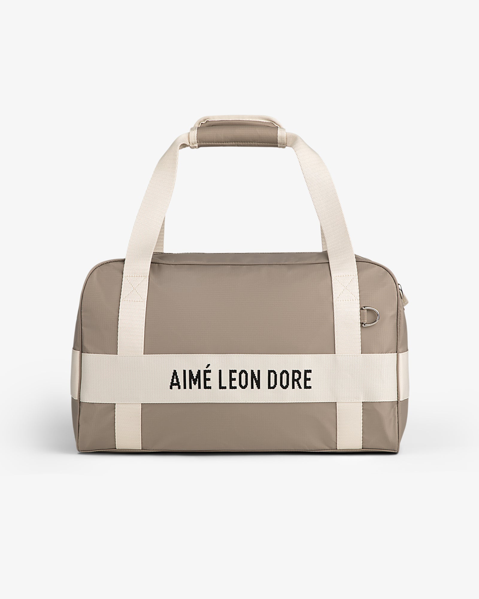 Beige Nylon Duffle Bag with white handles and "AIMÉ LEON DORE" in black on the front.
