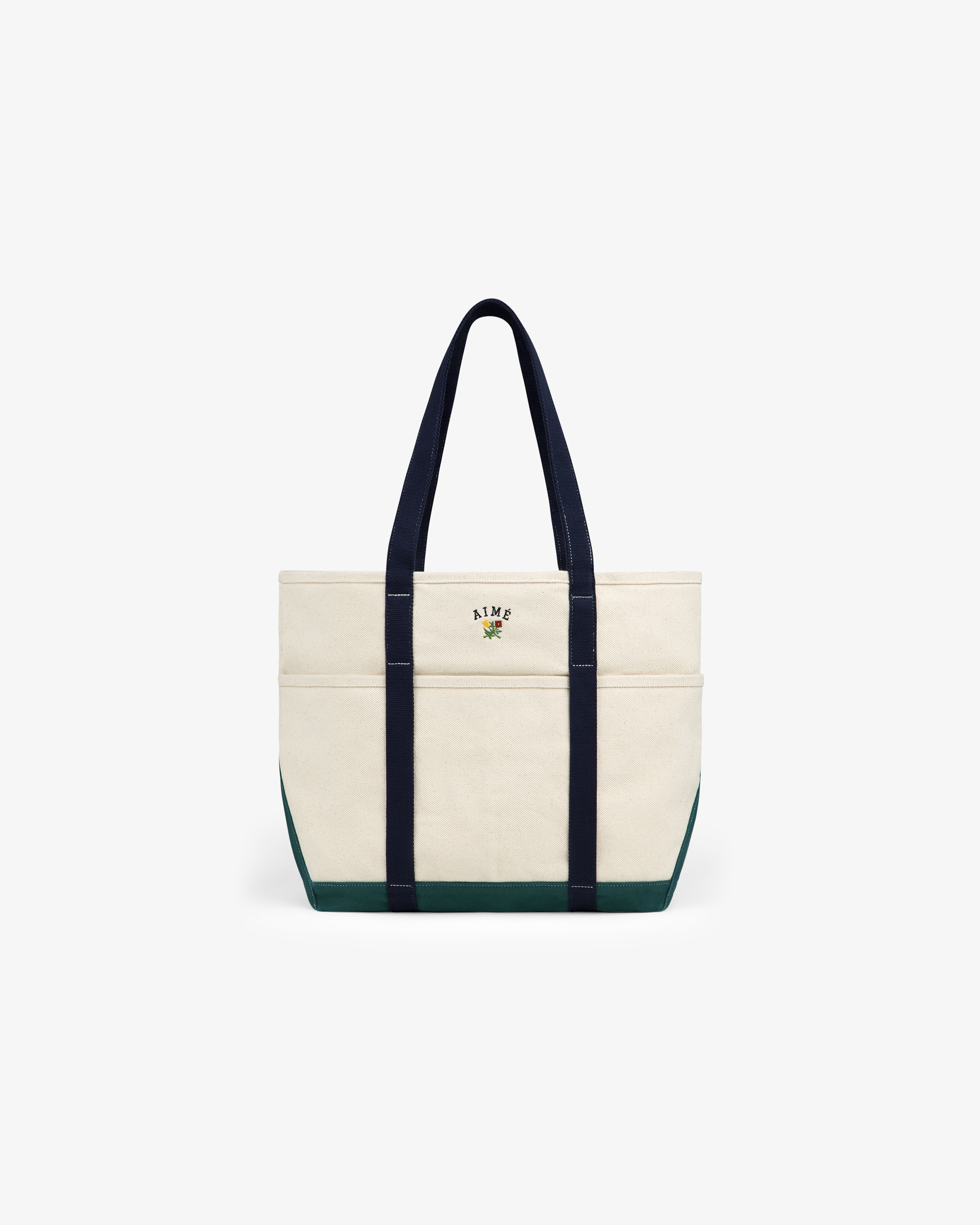 Large Crest Contrast Tote Bag with navy handles, green base, and small embroidered front-center design.