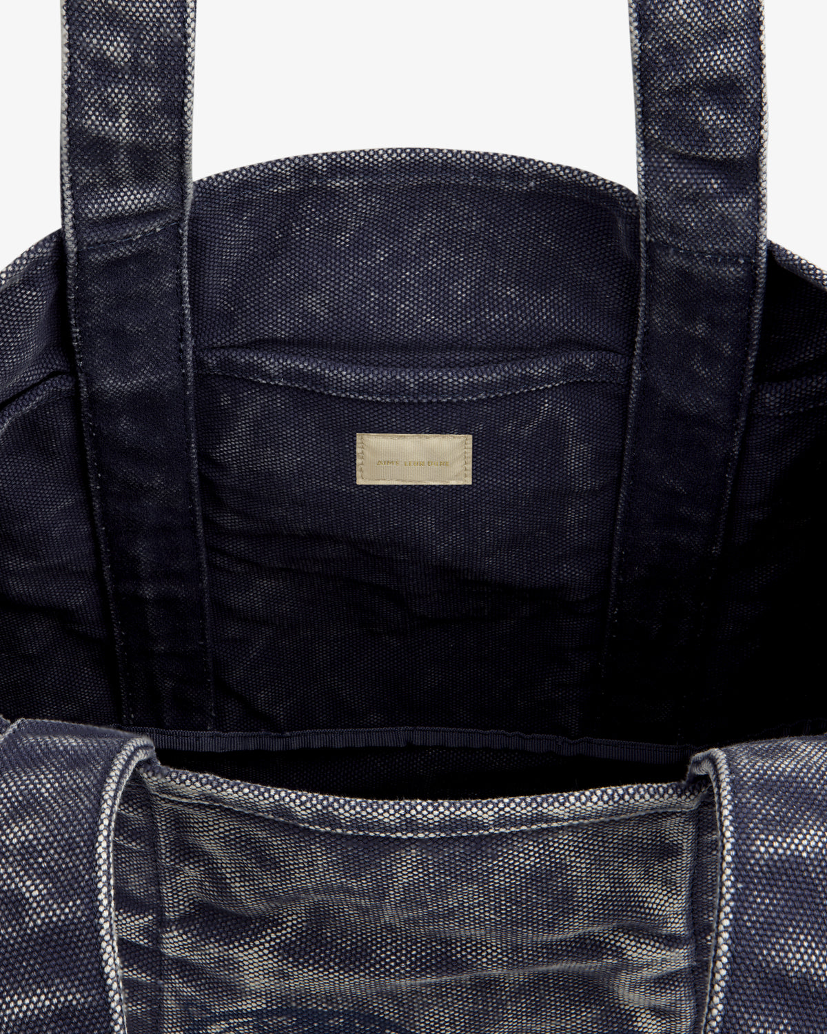 Sun Faded Large Unisphere Tote Bag in navy, open with sturdy handles and inner label, shown on a white background.
