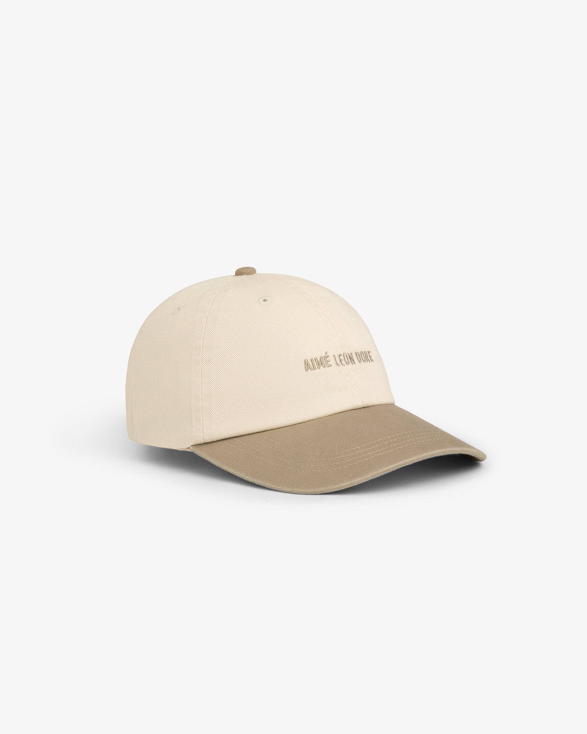Washed Chino Hat in beige with a light brown brim and subtle front text, shown on a white background.