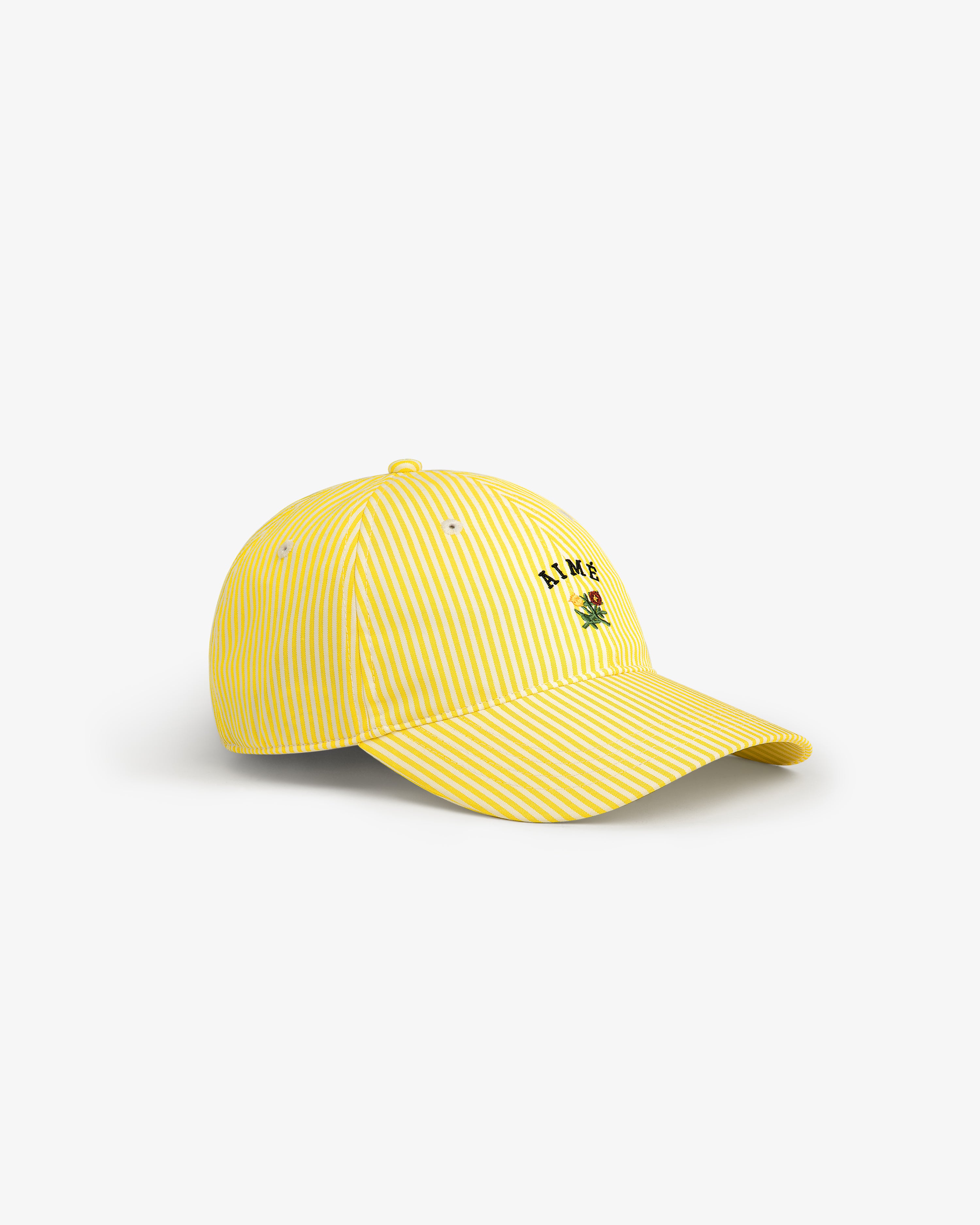 Striped Crest Logo Hat: Yellow and white stripes with a small green palm tree and black front text embroidery.