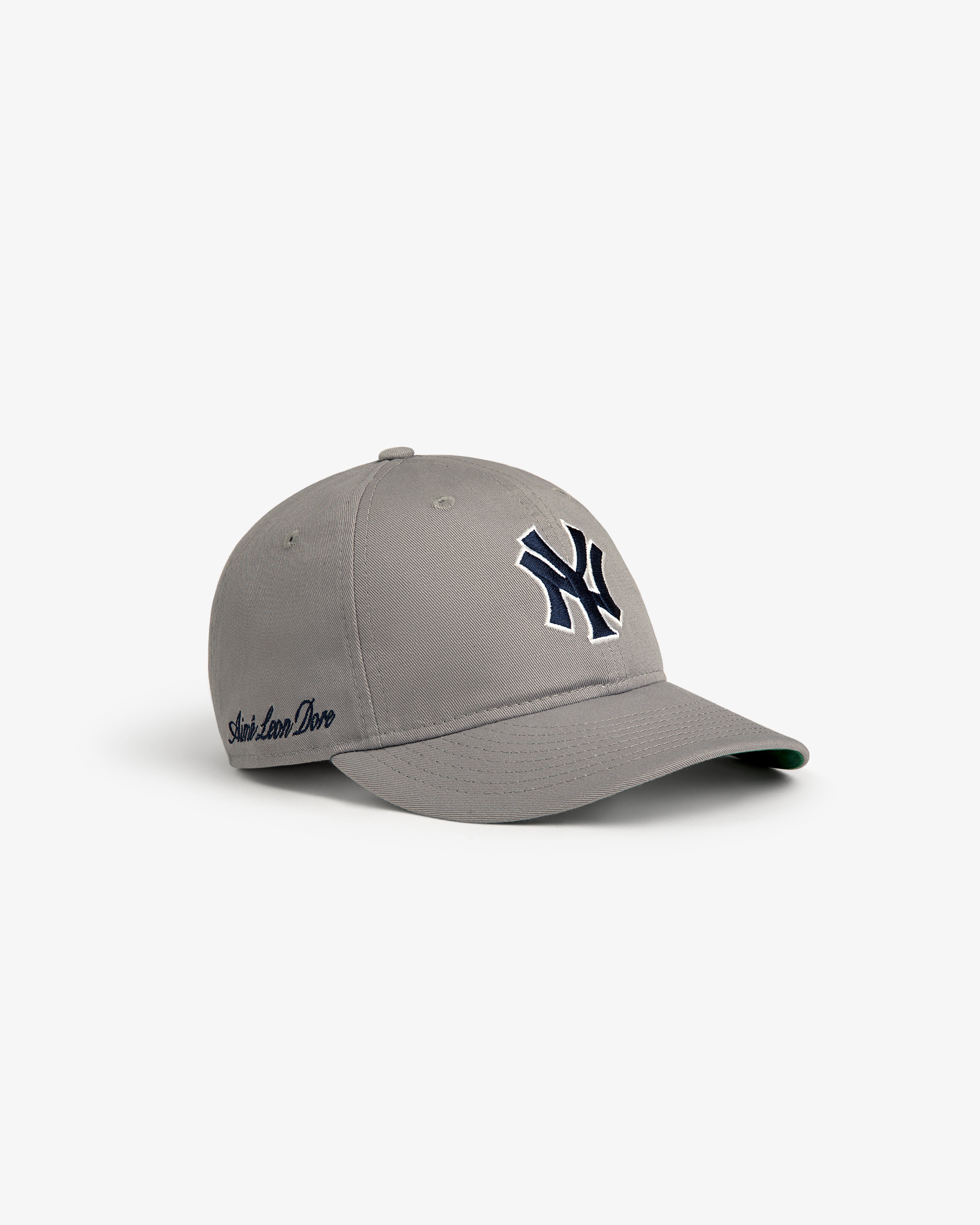 Gray ALD / New Era Yankees Retro Fit Hat with dark blue NY logo and Saint Louis Dive text on the side.