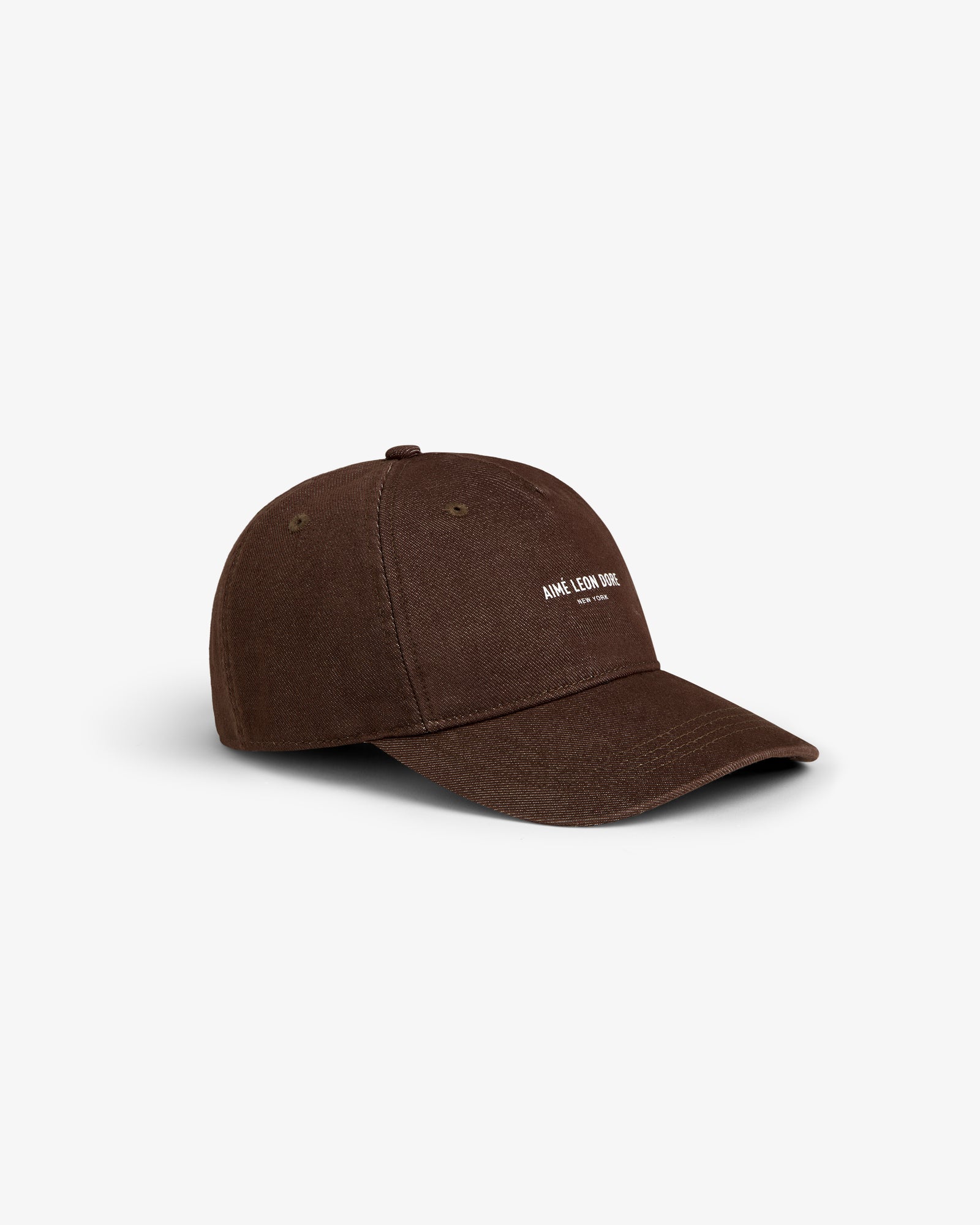 A brown Vintage Micro Logo Hat with small white AIME LEON DORE text on the front.