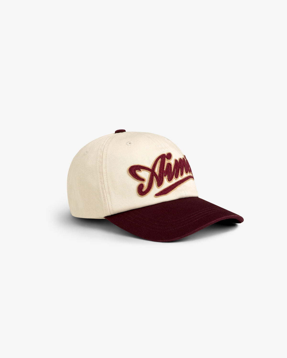 Beige and burgundy Cycling Logo Hat with Aimé embroidered on the front in bold, cursive burgundy lettering.